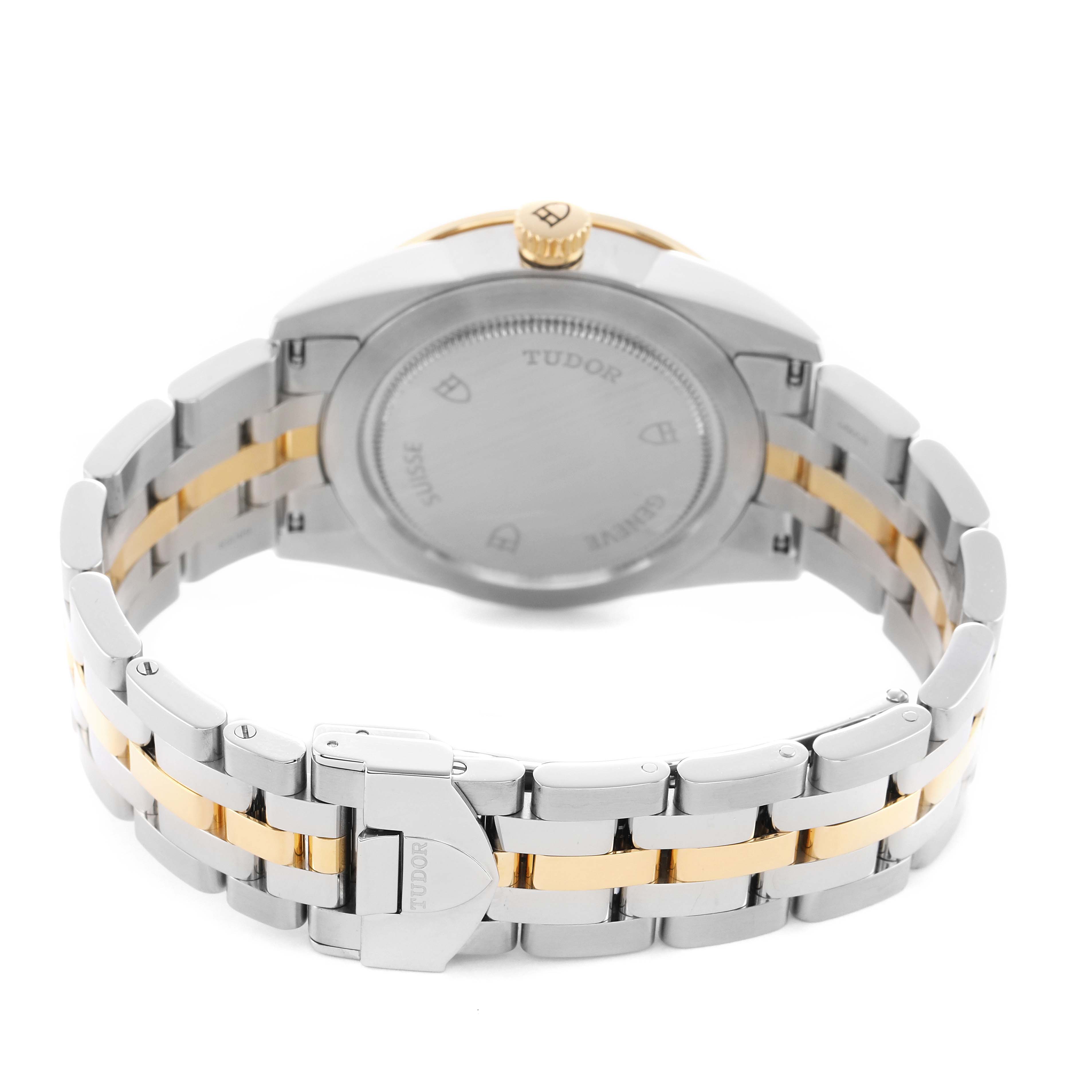 This image shows the back view of the Tudor Glamour 55003-0007 Men's Steel and Gold (two tone) Black Dial model watch, highlighting the case back, crown, and two-tone bracelet.