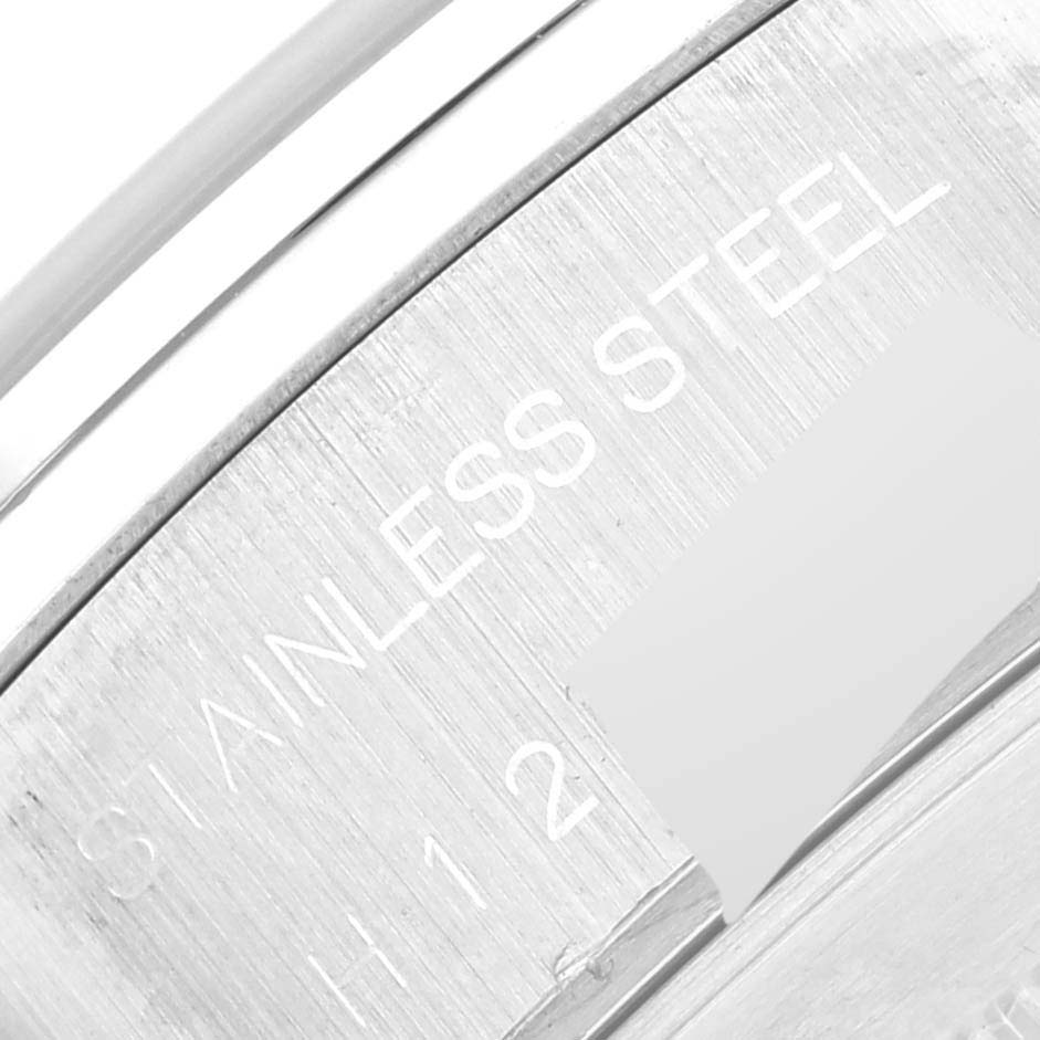 This image shows a close-up of the stainless steel back of a Tudor Tiger 79263 Men's Steel and Gold (two tone) White Dial 79263 Men's Steel and Gold (two tone) White Dial watch.