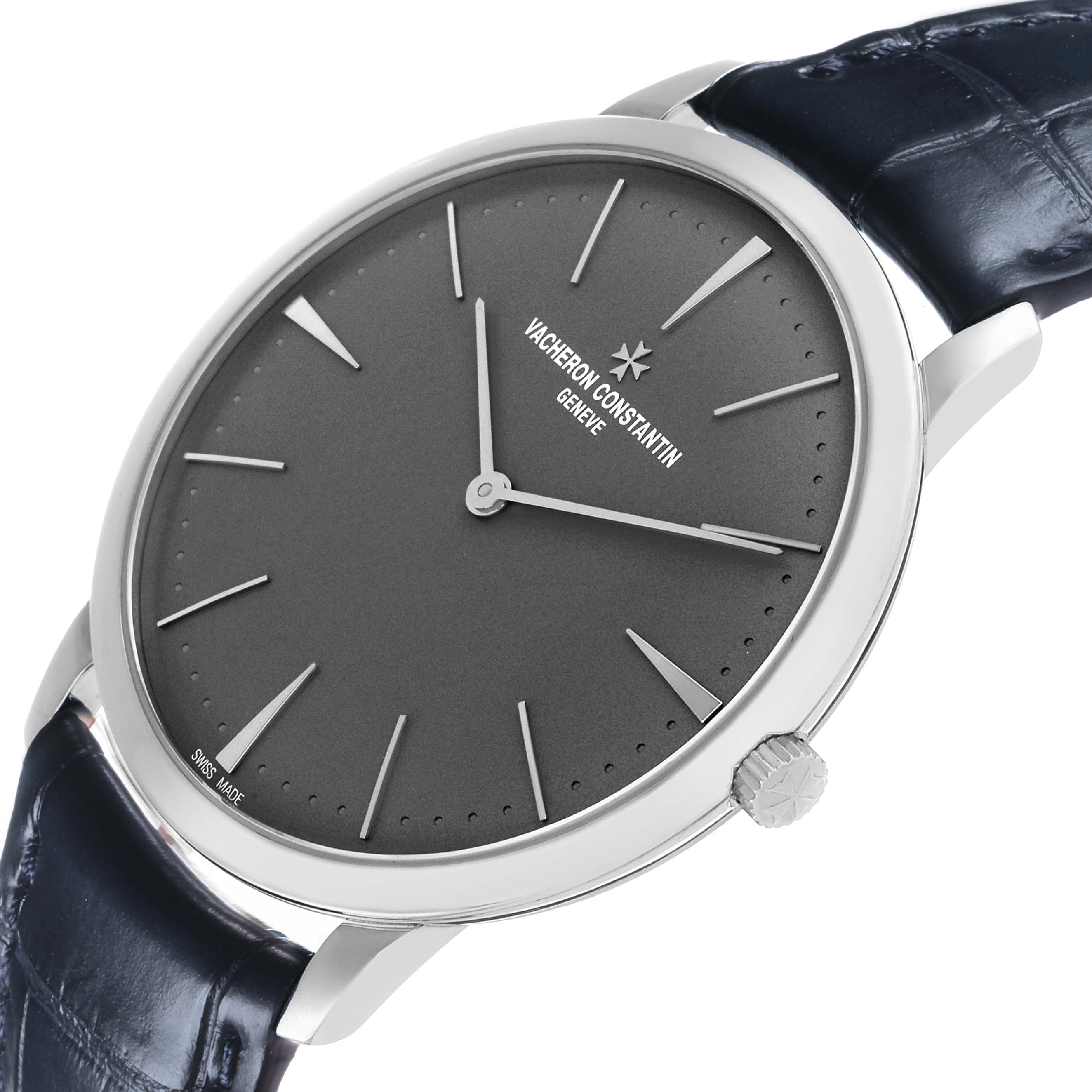 The Vacheron Constantin Patrimony 81180/000P-9539 Men's Platinum Grey Dial watch is shown at a slight angle highlighting the dial, hands, crown, and leather strap.