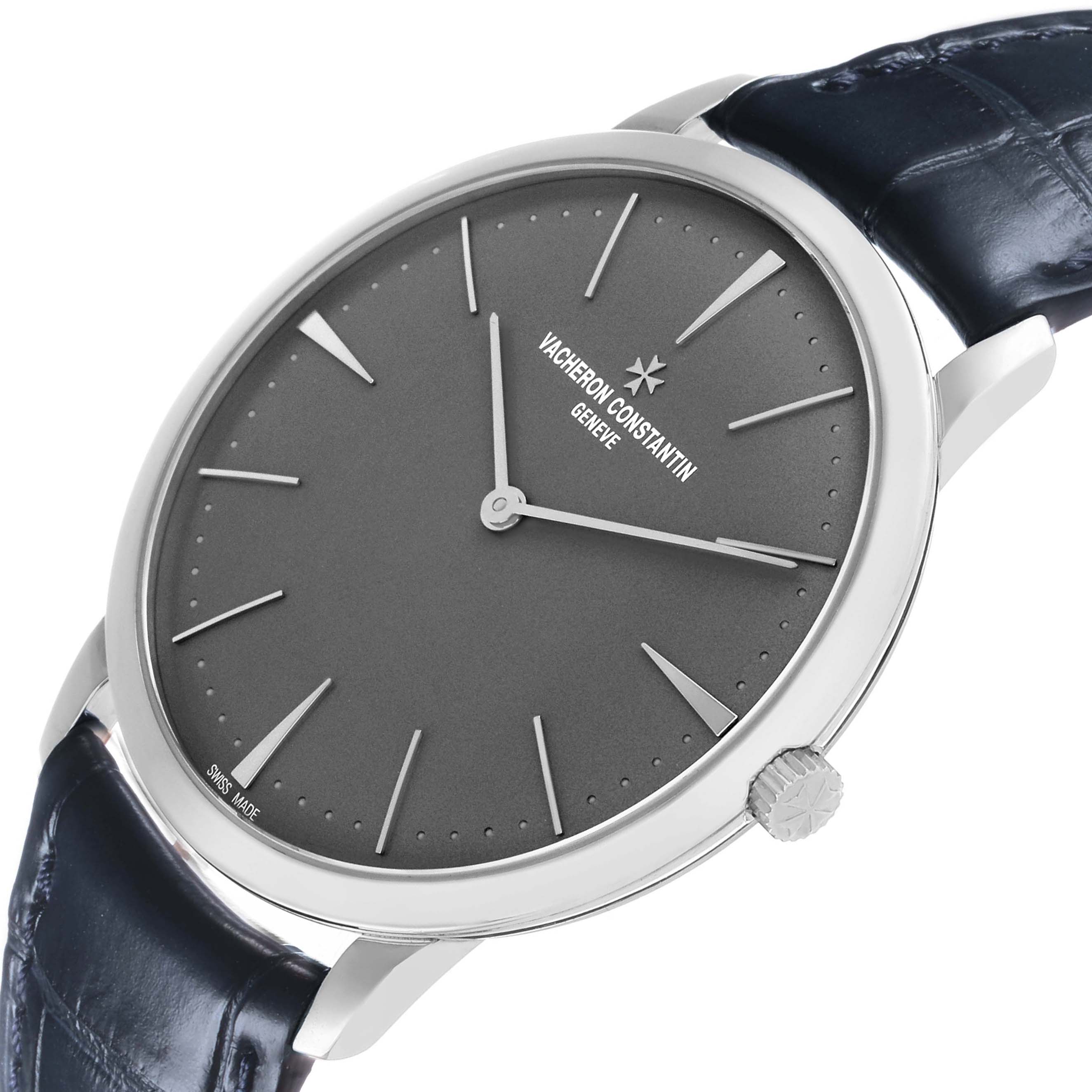 The Vacheron Constantin Patrimony 81180/000P-9539 Men's Platinum Grey Dial watch is shown at a slight angle, highlighting its face, crown, and part of the leather strap.