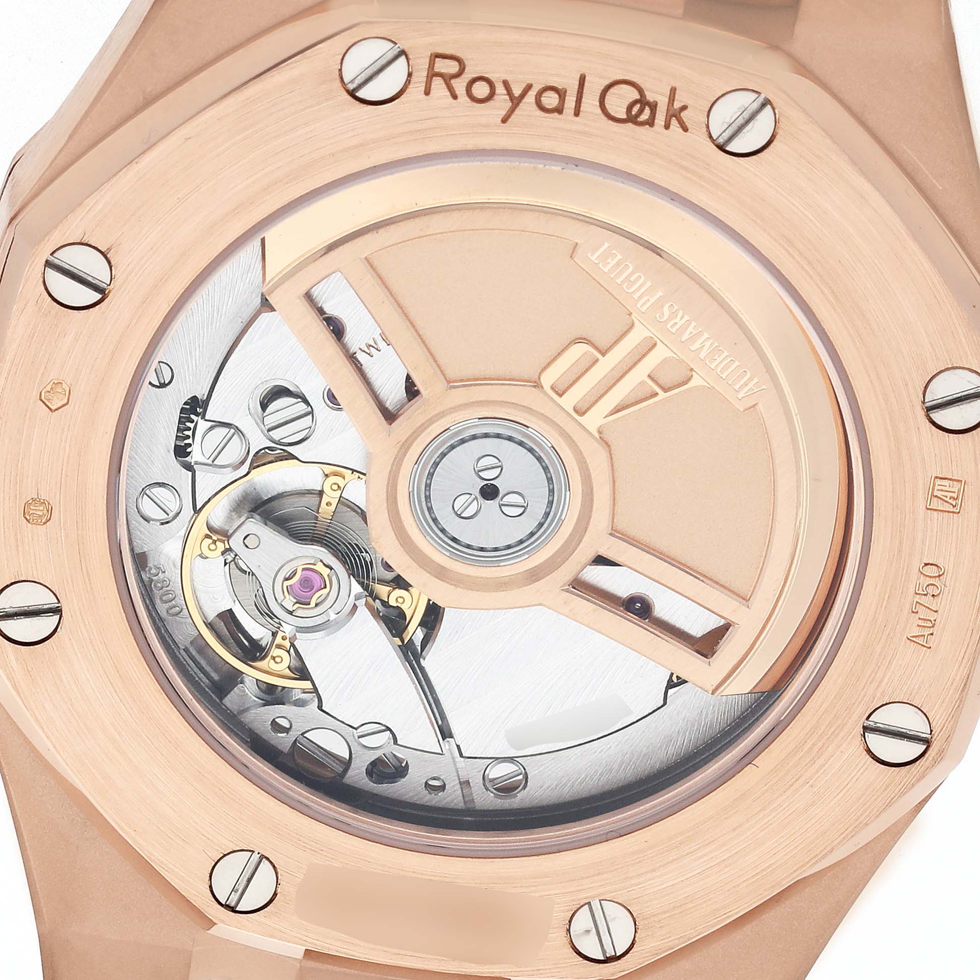 The image shows the case back of the Audemars Piguet Royal Oak 77451OR Women's Rose Gold Blue Dial, revealing its movement and rotor.