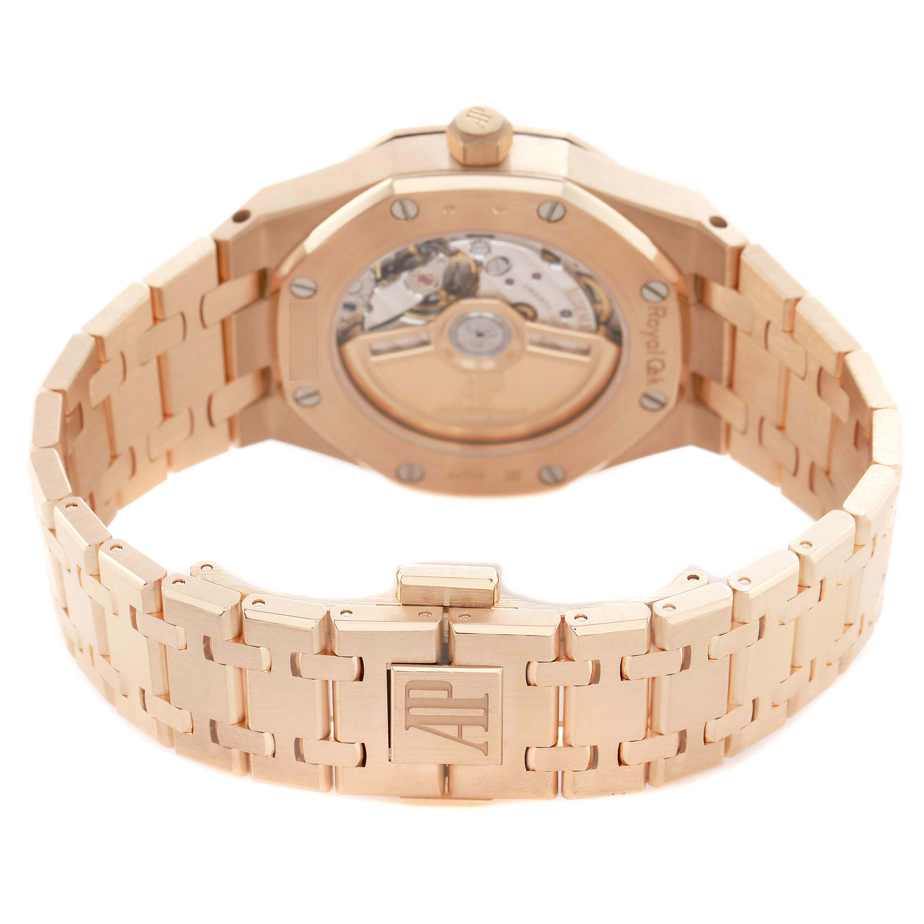 The image shows the back view of the Audemars Piguet Royal Oak 77451OR Women's Rose Gold Blue Dial, highlighting the case back, bracelet, and AP clasp.