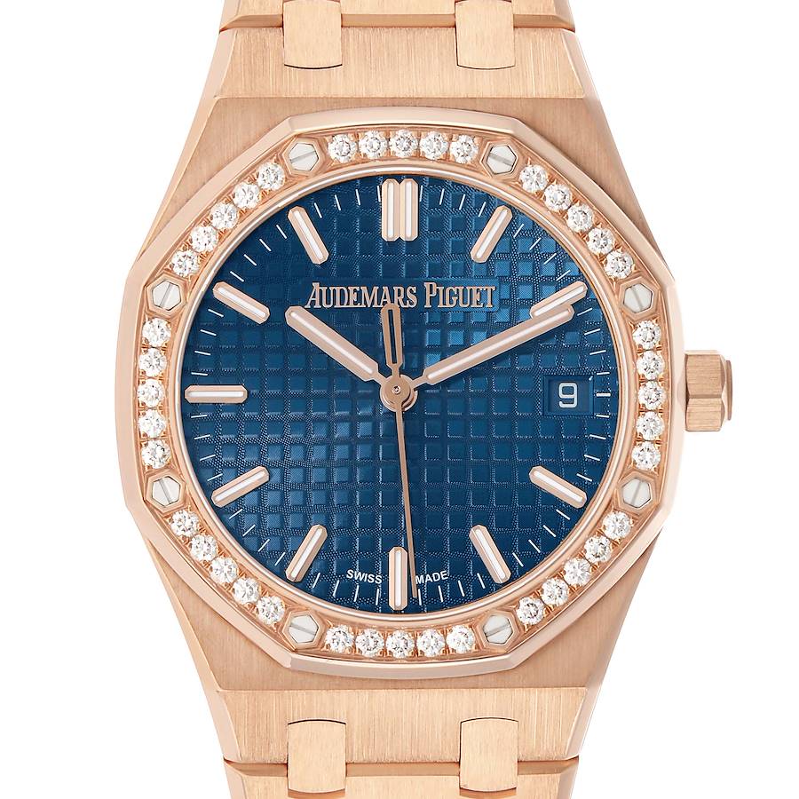 The Audemars Piguet Royal Oak 77451OR Women's Rose Gold Blue Dial watch is shown from the front, highlighting the blue dial, diamond-set bezel, and bracelet.