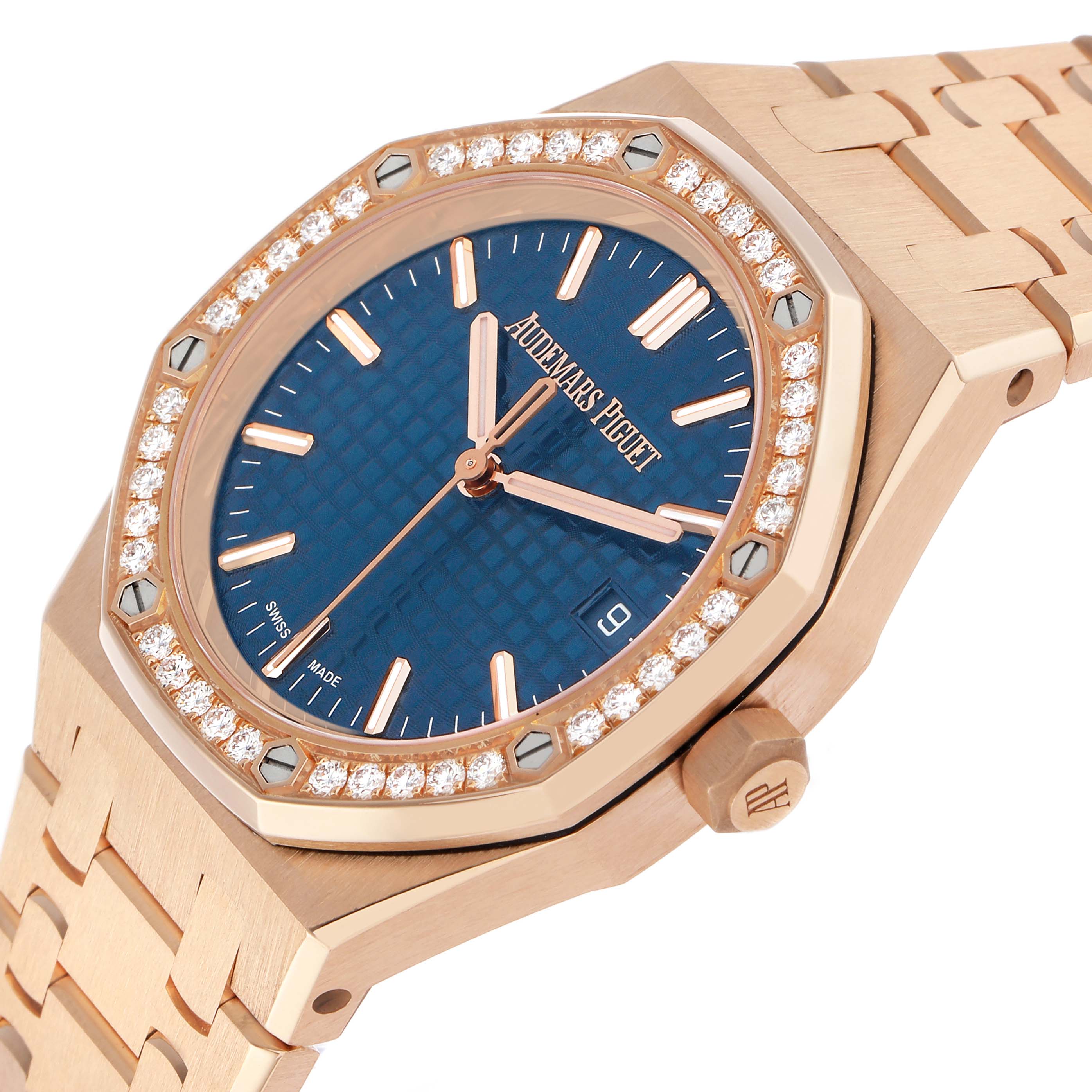 The Audemars Piguet Royal Oak 77451OR Women's Rose Gold Blue Dial watch is shown at an angle highlighting the dial, bezel with diamonds, and part of the bracelet.