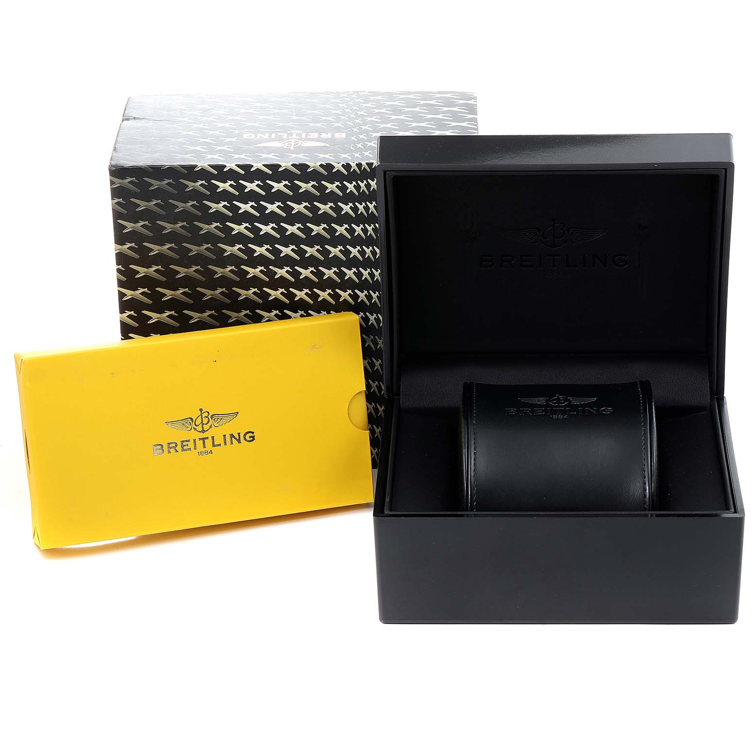 The image shows the packaging and presentation box for a Breitling Superocean A17390 Men
s Stainless Steel Blue Dial A17390 Men
s Stainless Steel Blue Dial watch, including an outer box, inner box, and a yellow booklet.
