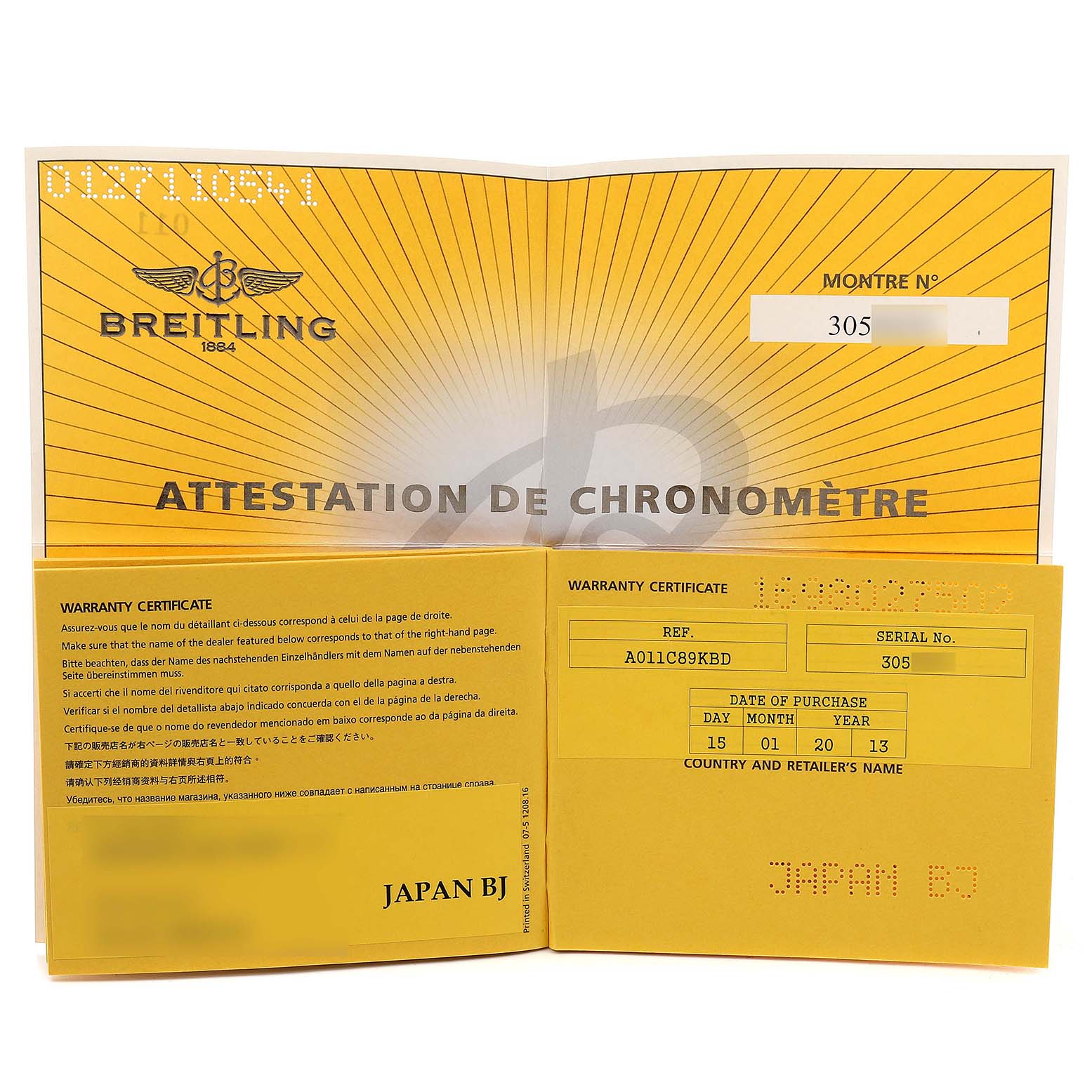 This image shows the Breitling Chronomat AB0110 Men
s Stainless Steel Blue Dial AB0110 Men
s Stainless Steel Blue Dial warranty booklet open, displaying the attestation and warranty certificate details.