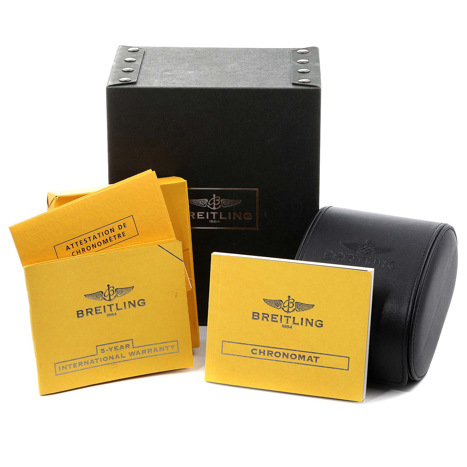 The image shows the accessories for a Breitling Chronomat AB0110 Men
s Stainless Steel Blue Dial AB0110 Men
s Stainless Steel Blue Dial, including warranty booklets, a black watch case, and the outer box.