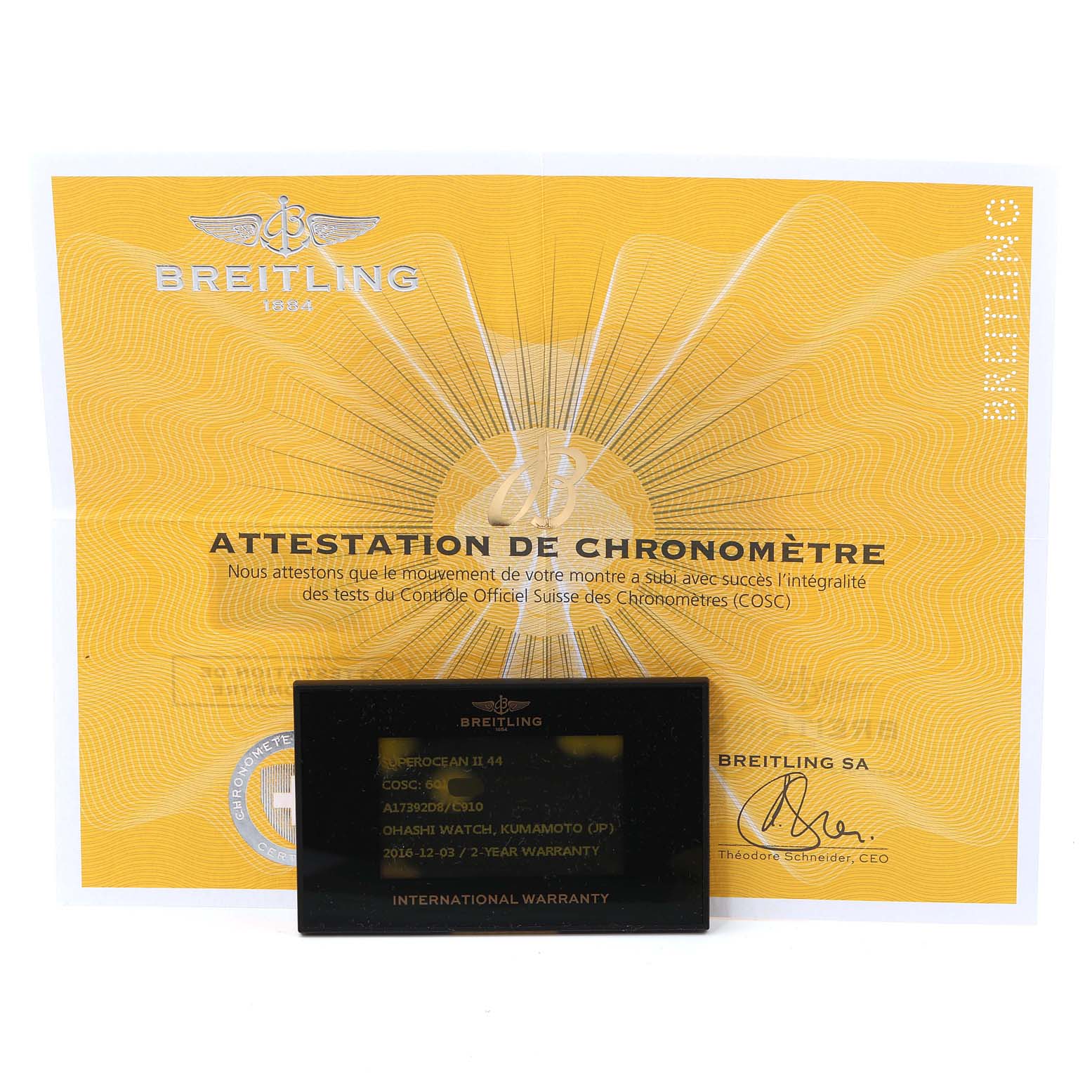 The image shows the warranty card and chronometer certification for a Breitling Superocean A17392 Men's Stainless Steel Blue Dial A17392 Men's Stainless Steel Blue Dial watch, taken from the front.