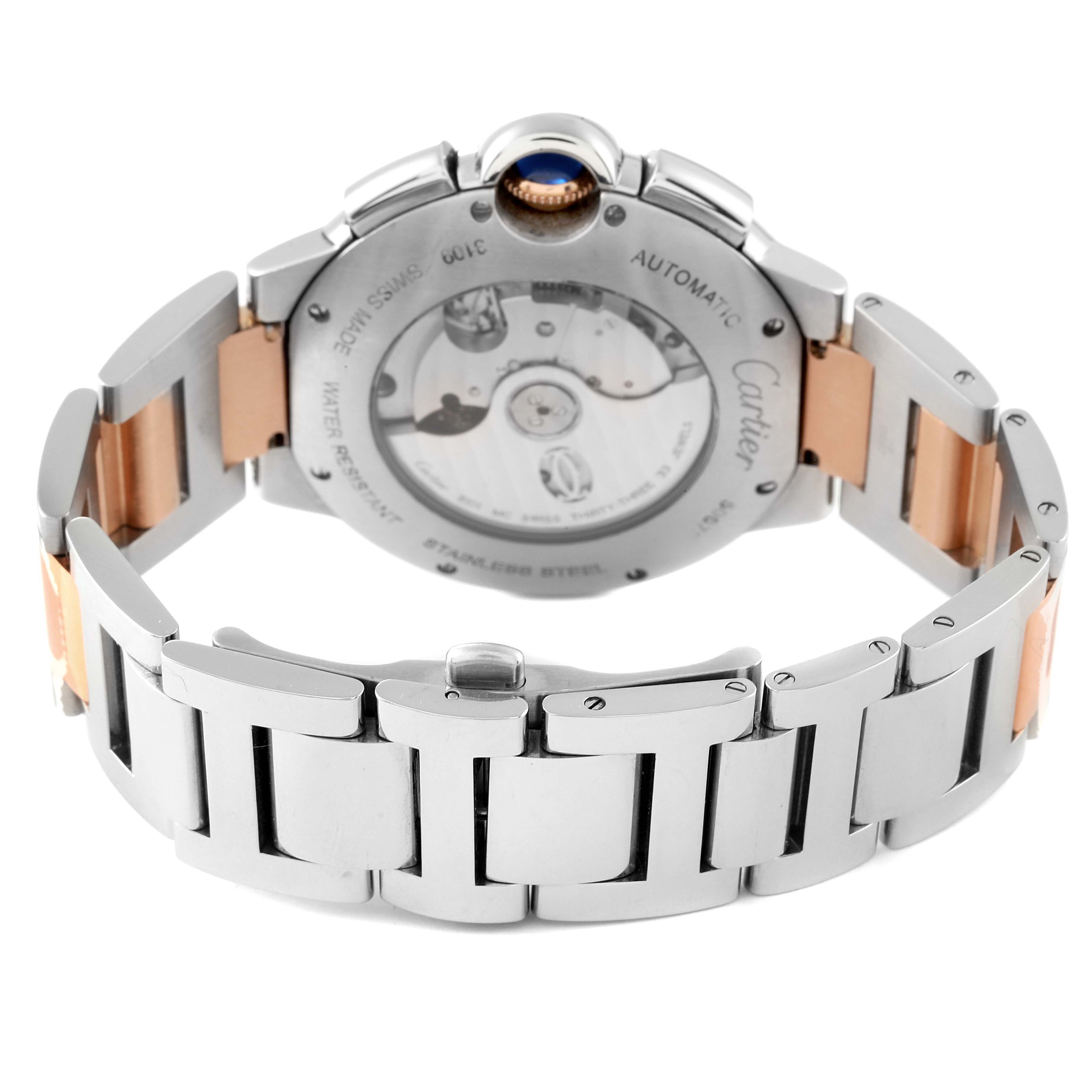 The image shows the back view of a Cartier Ballon Bleu W6920063 Men's Steel and Gold (two tone) Silver Dial W6920063 Men's Steel and Gold (two tone) Silver Dial watch, highlighting its automatic movement and two-tone bracelet.