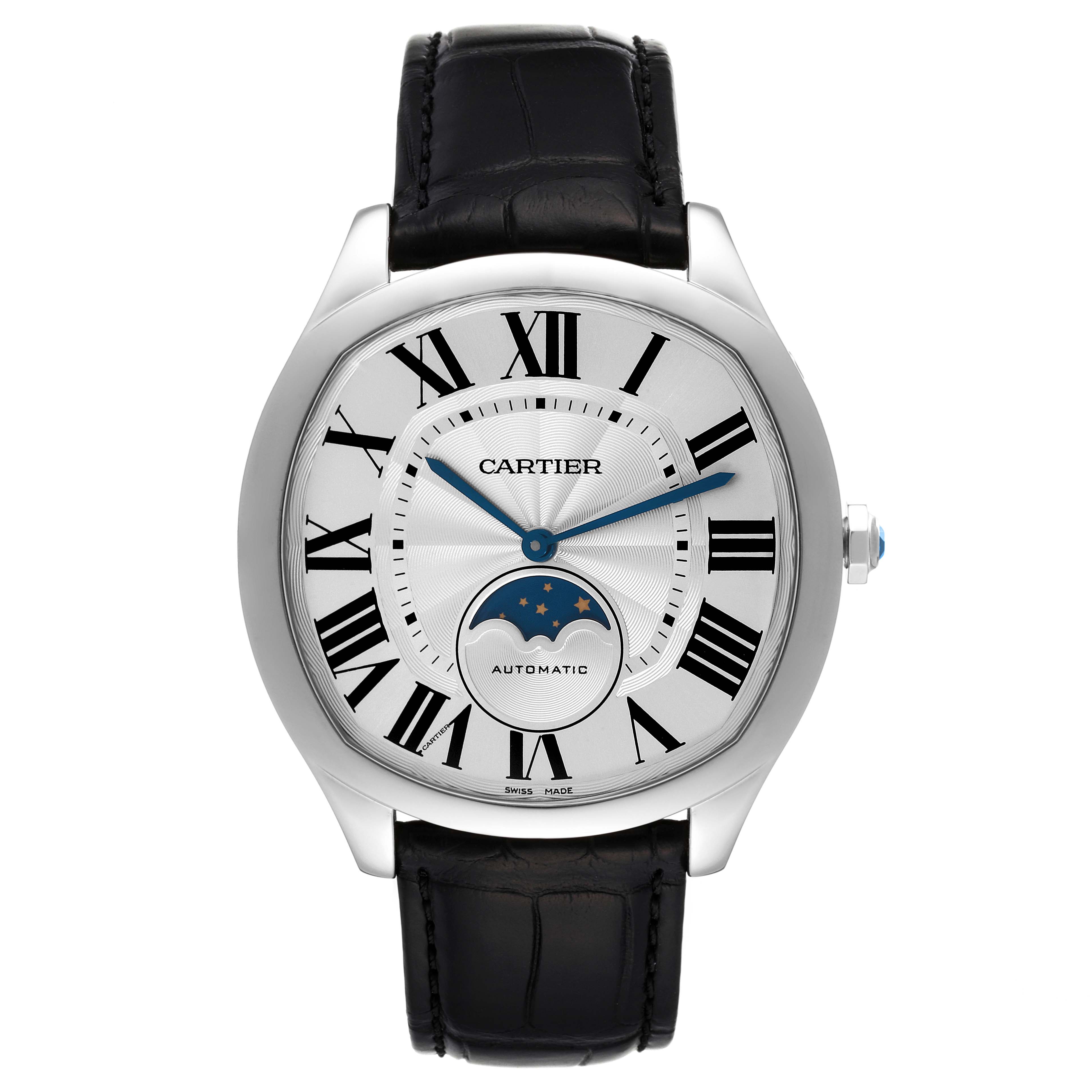 The image shows a front view of the Drive de Cartier model watch by Cartier, highlighting its Roman numerals, blue hands, and moonphase indicator.