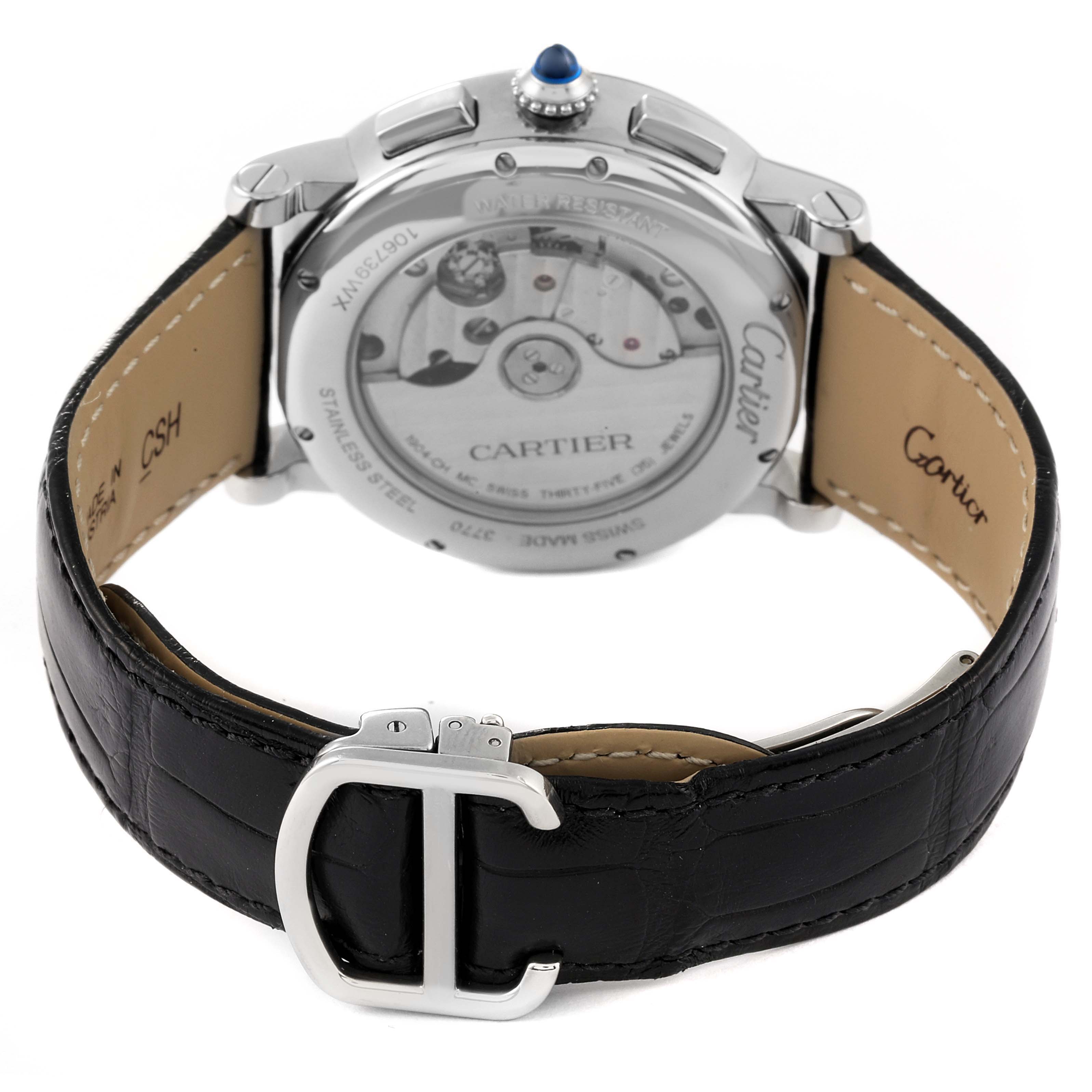 The image shows the back view of the Rotonde de Cartier watch, highlighting the movement and leather strap with buckle.