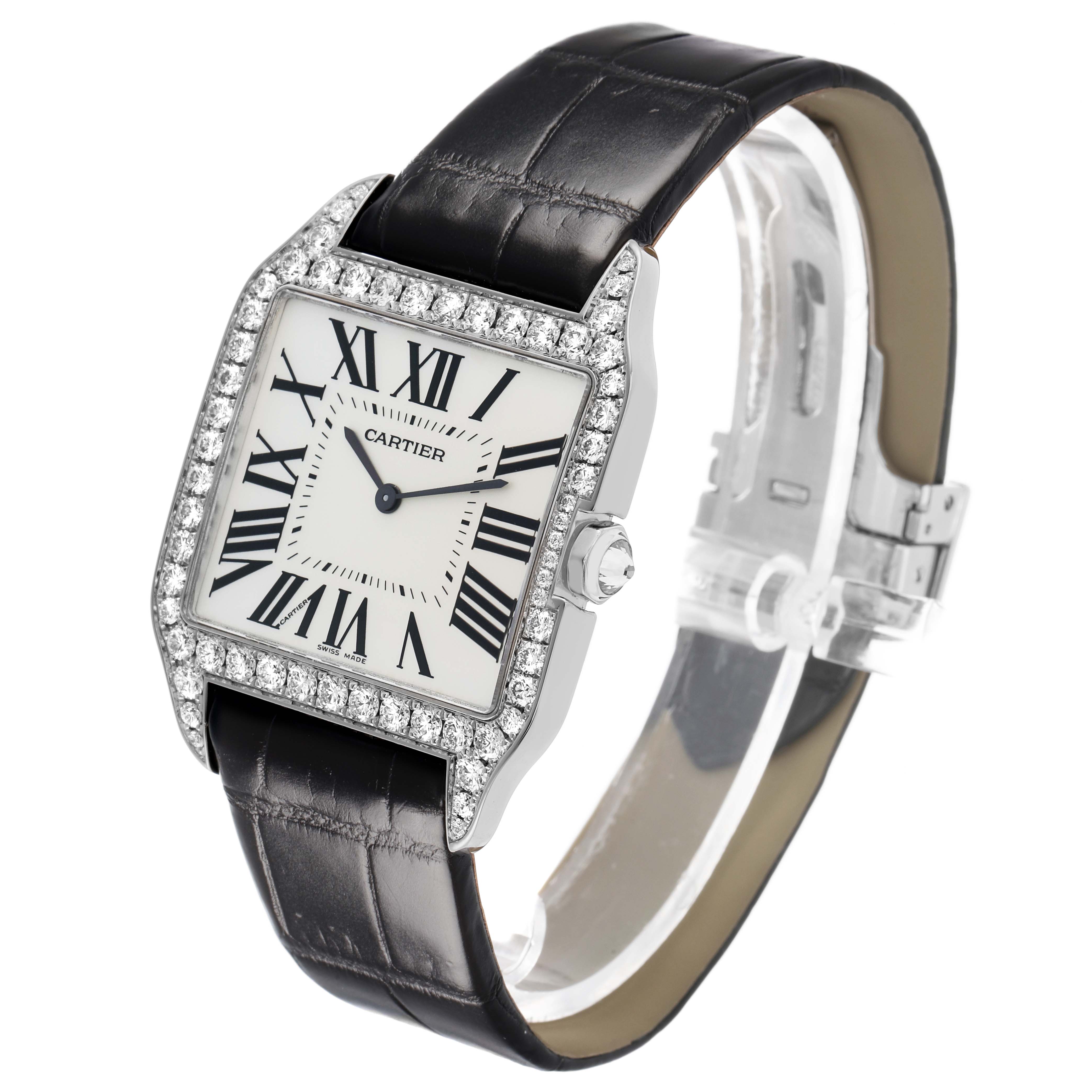 The Cartier Santos Dumont WH100651 Men's White Gold Silver Dial watch is shown at a three-quarter angle, highlighting the face, diamond bezel, and leather strap.