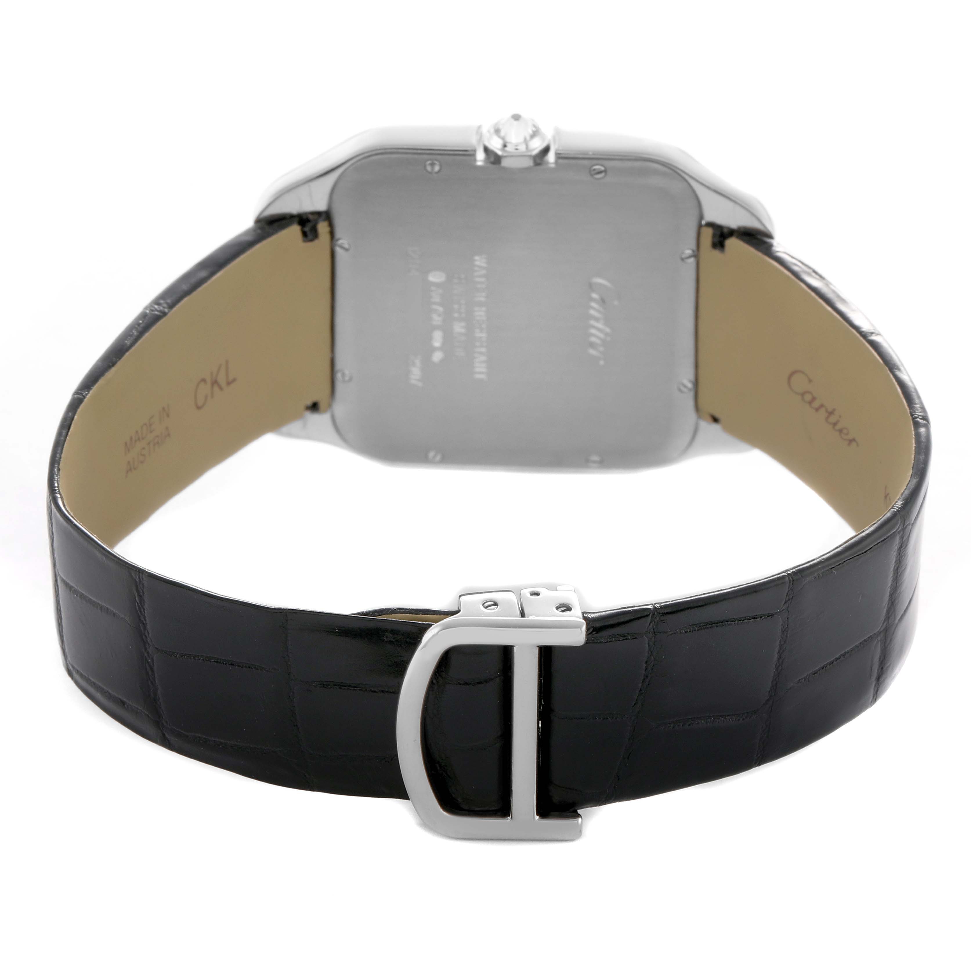 The image shows the back view of the Cartier Santos Dumont WH100651 Men's White Gold Silver Dial watch, highlighting the case back and leather strap with a clasp.