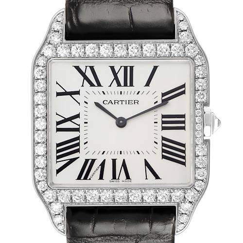 The Cartier Santos Dumont WH100651 Men's White Gold Silver Dial watch is shown from the front, highlighting the diamond bezel, Roman numerals, and black leather strap.