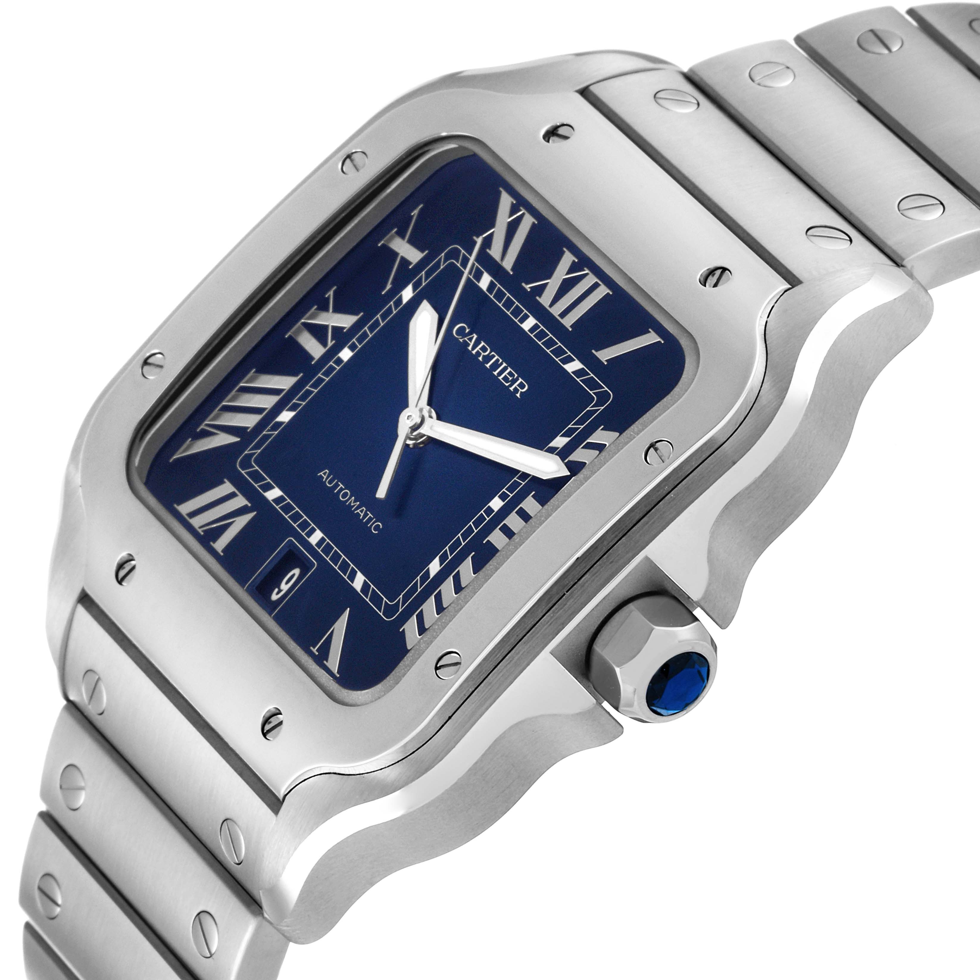 The image shows a close-up of the Cartier Santos WSSA0030 Men's Stainless Steel Blue Dial WSSA0030 Men's Stainless Steel Blue Dial watch face, bezel, and part of the bracelet from a side angle.
