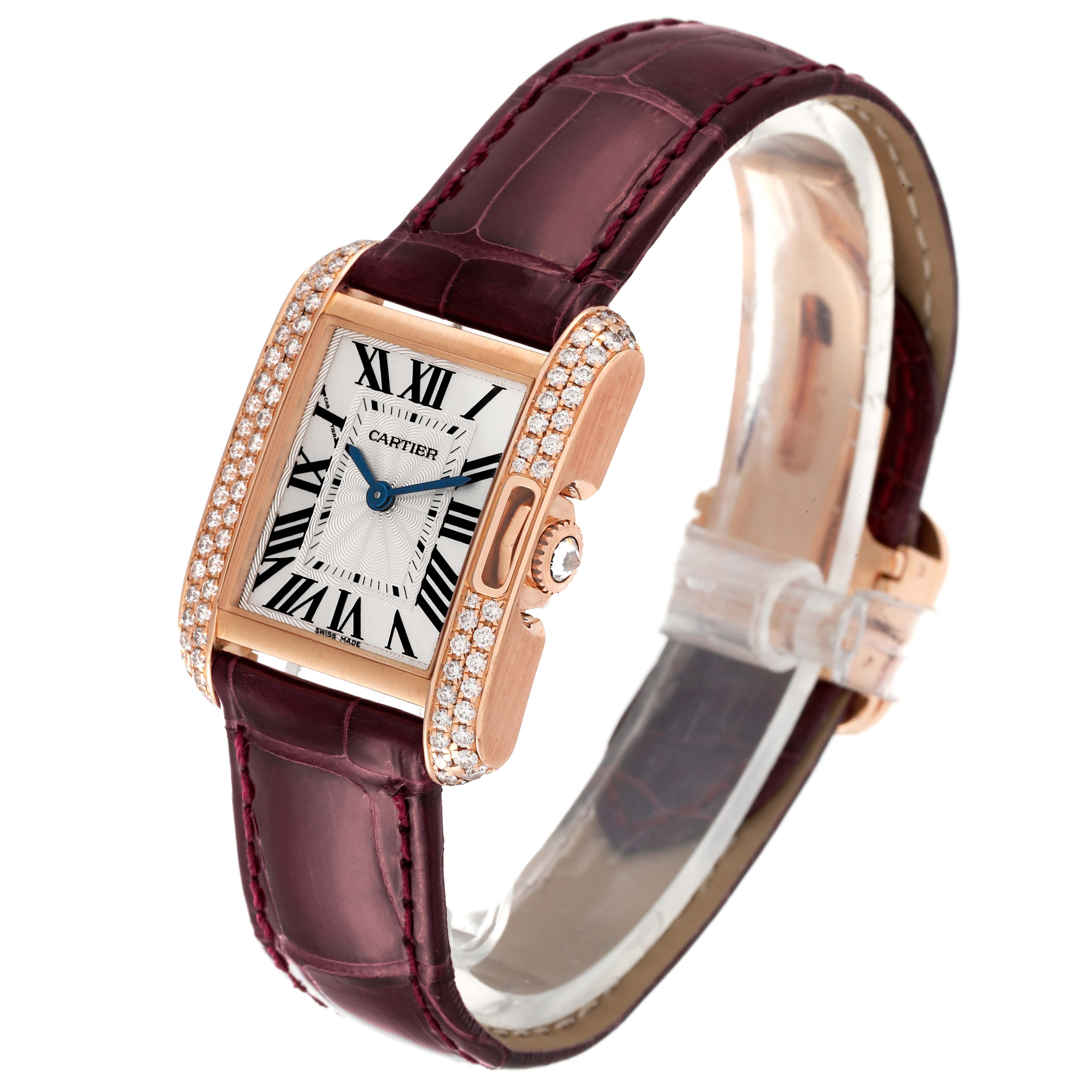 This Cartier Tank Anglaise WT100013 Women's Rose Gold Silver Dial WT100013 Women's Rose Gold Silver Dial watch is shown at an angle highlighting its face, case, crown, and leather strap.