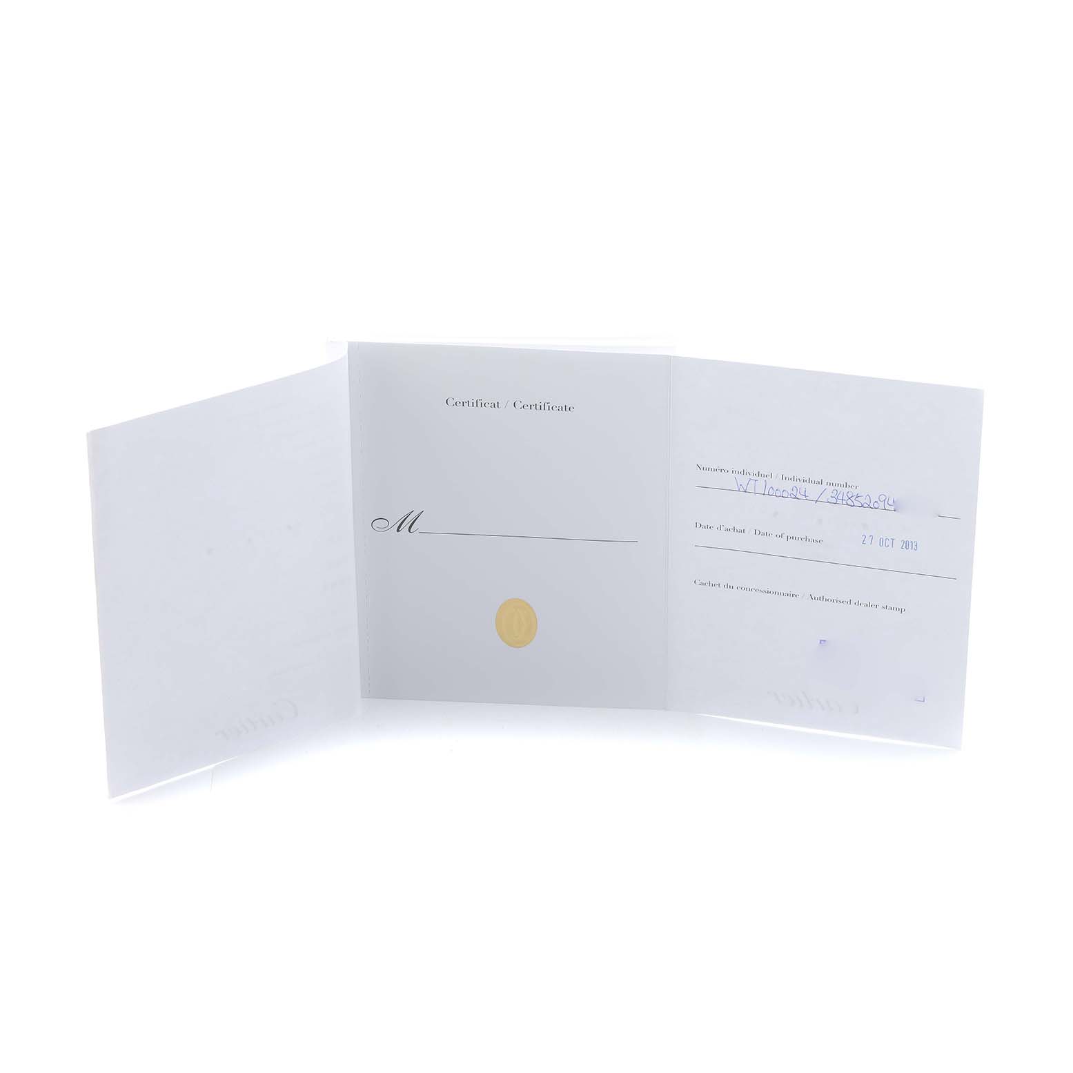 The image shows a Cartier certificate booklet for the Tank Anglaise model, open to reveal its interior pages.