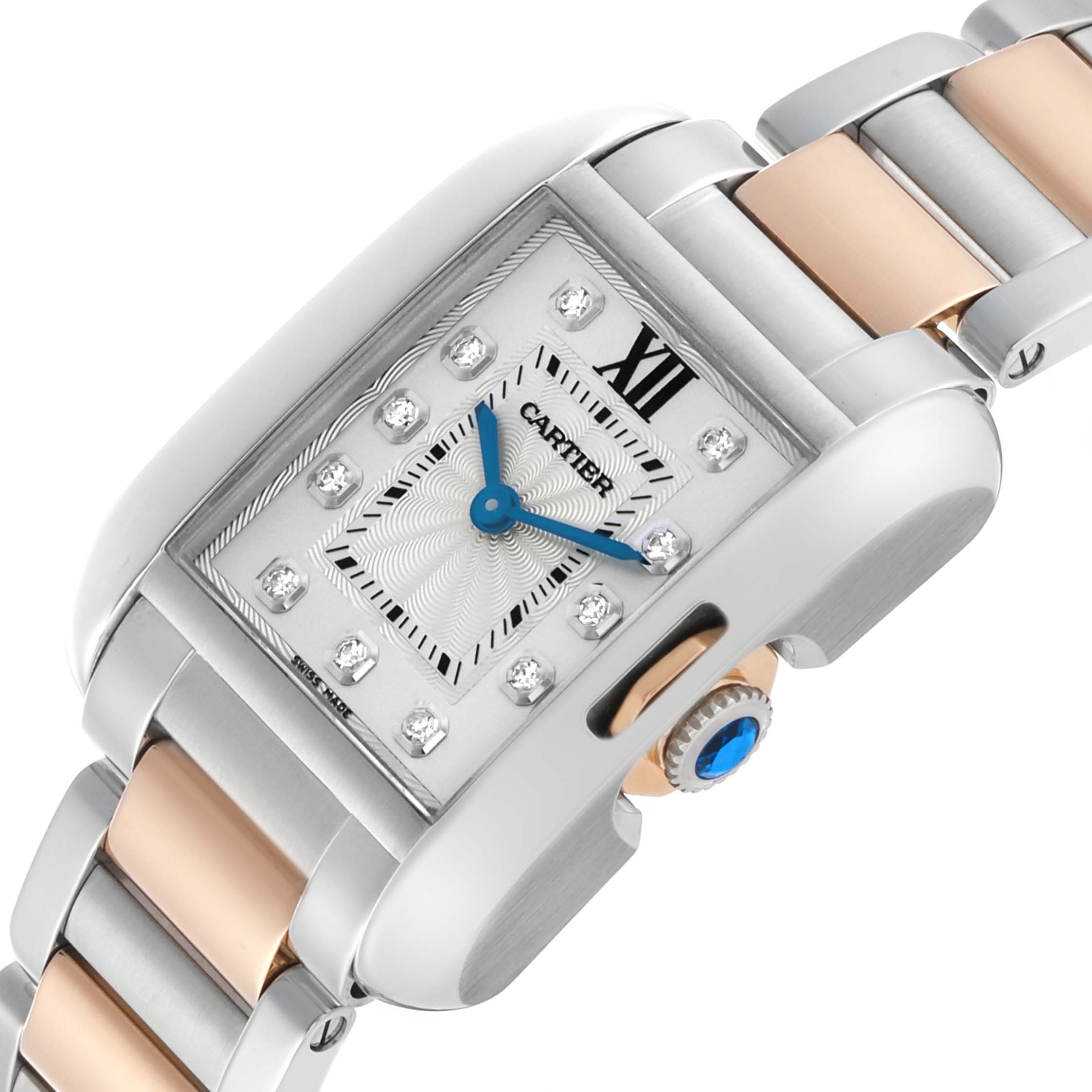 The image shows the Cartier Tank Anglaise WT100024 Women's Steel and Gold (two tone) Silver Dial watch at a slight angle, highlighting the face, bracelet, and crown with a blue gemstone.
