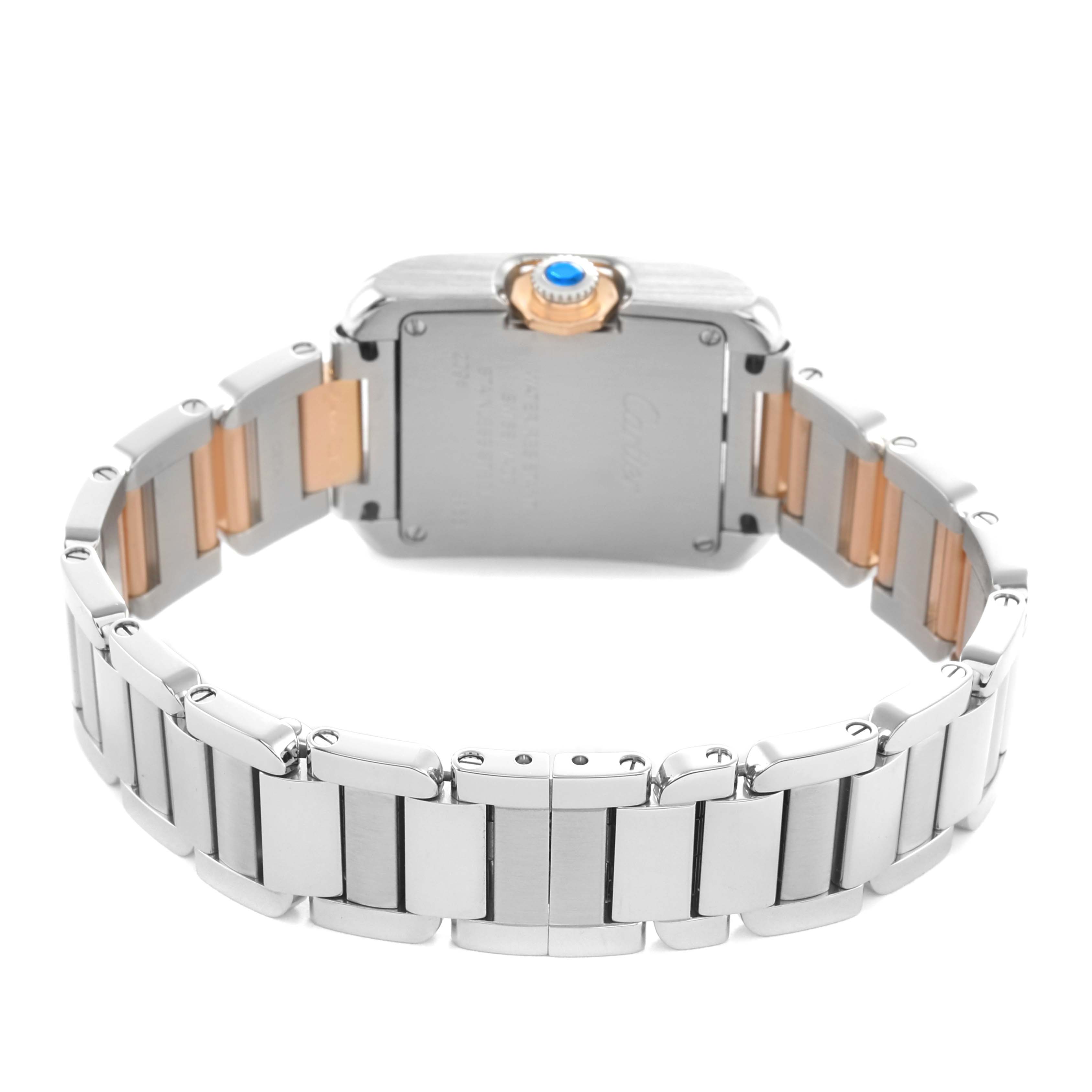 The Cartier Tank Anglaise WT100024 Women's Steel and Gold (two tone) Silver Dial watch is shown from the back, highlighting the bracelet and crown with a visible blue gem.