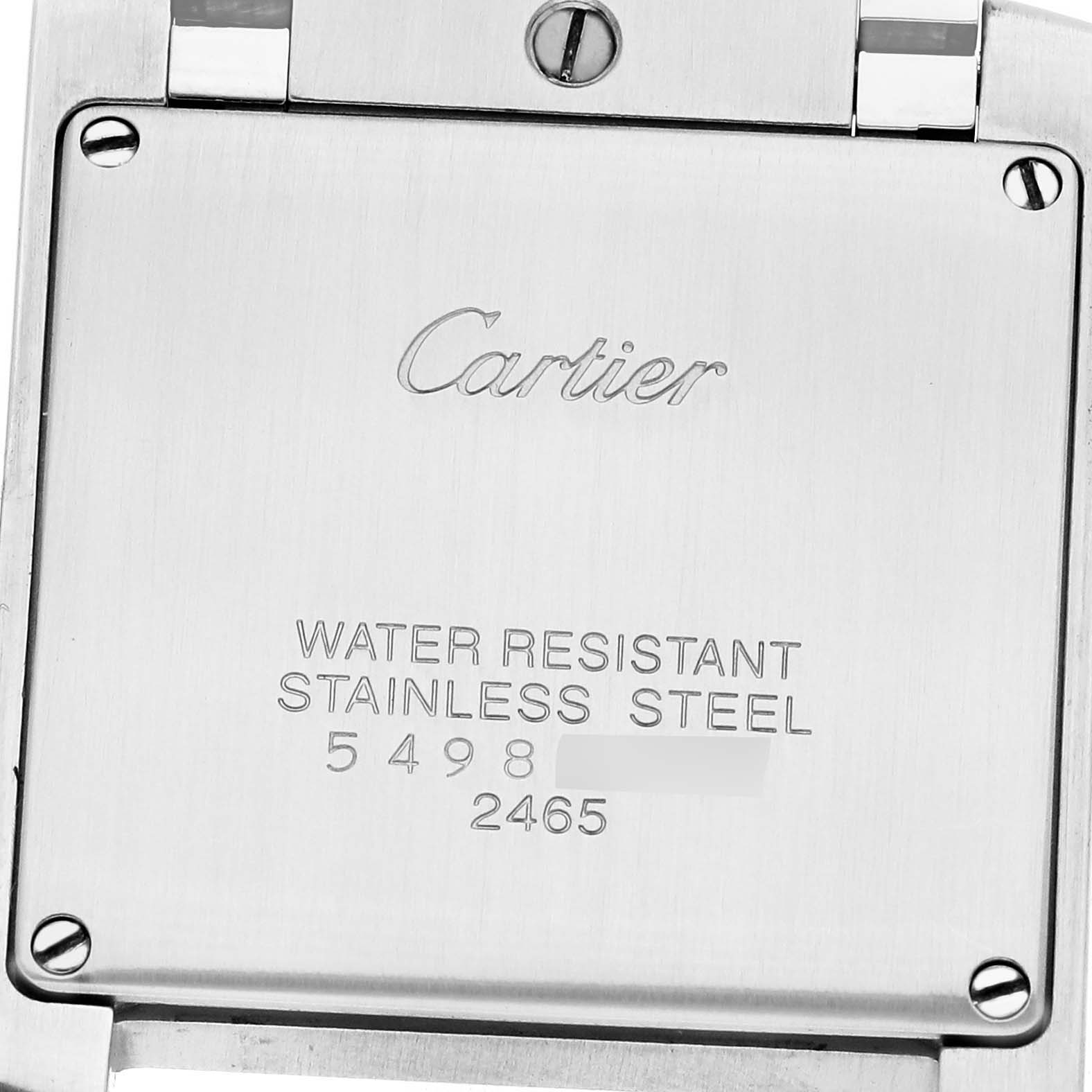 The image shows the back casing of a Cartier Tank Française watch, highlighting its stainless steel material and engraved details.