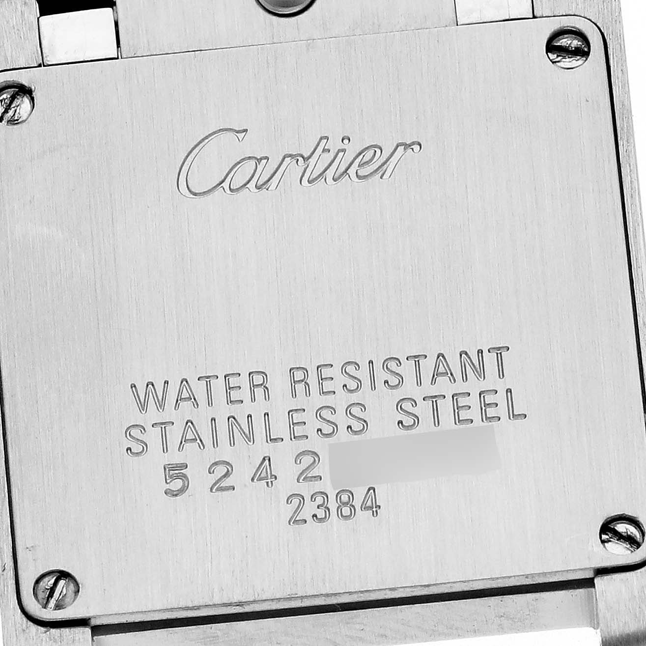 The image shows the back case of the Tank Française watch by Cartier, highlighting its water resistance and stainless steel material.