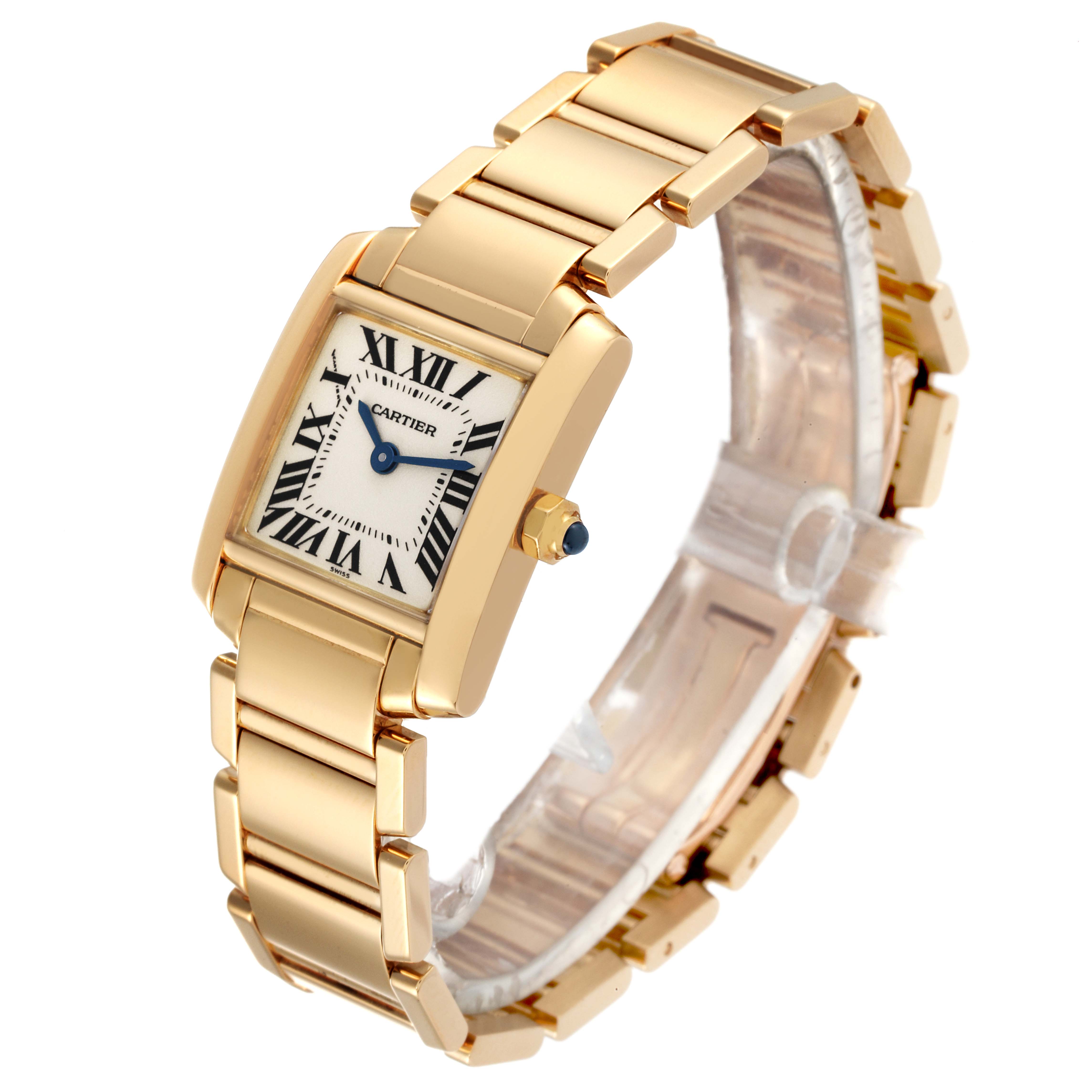 The shown Cartier Tank Francaise W50002N2 Women's Yellow Gold Silver Dial W50002N2 Women's Yellow Gold Silver Dial watch is viewed at an angled perspective, highlighting the gold case, bracelet, and dial with Roman numerals.