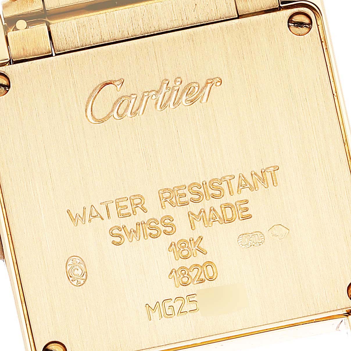 The image shows the back plate of a Cartier Tank Francaise W50002N2 Women's Yellow Gold Silver Dial W50002N2 Women's Yellow Gold Silver Dial watch, displaying its engravings and markings.