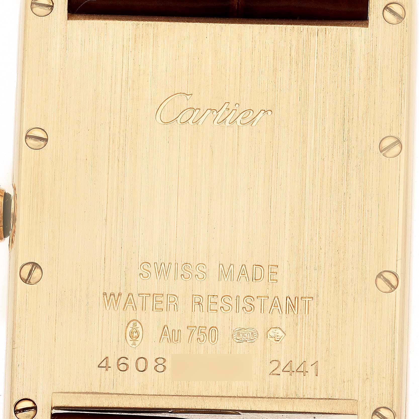 The image shows the back of the Cartier Tank Louis W1529756 Men's Yellow Gold Silver Dial watch, highlighting engravings and screws.