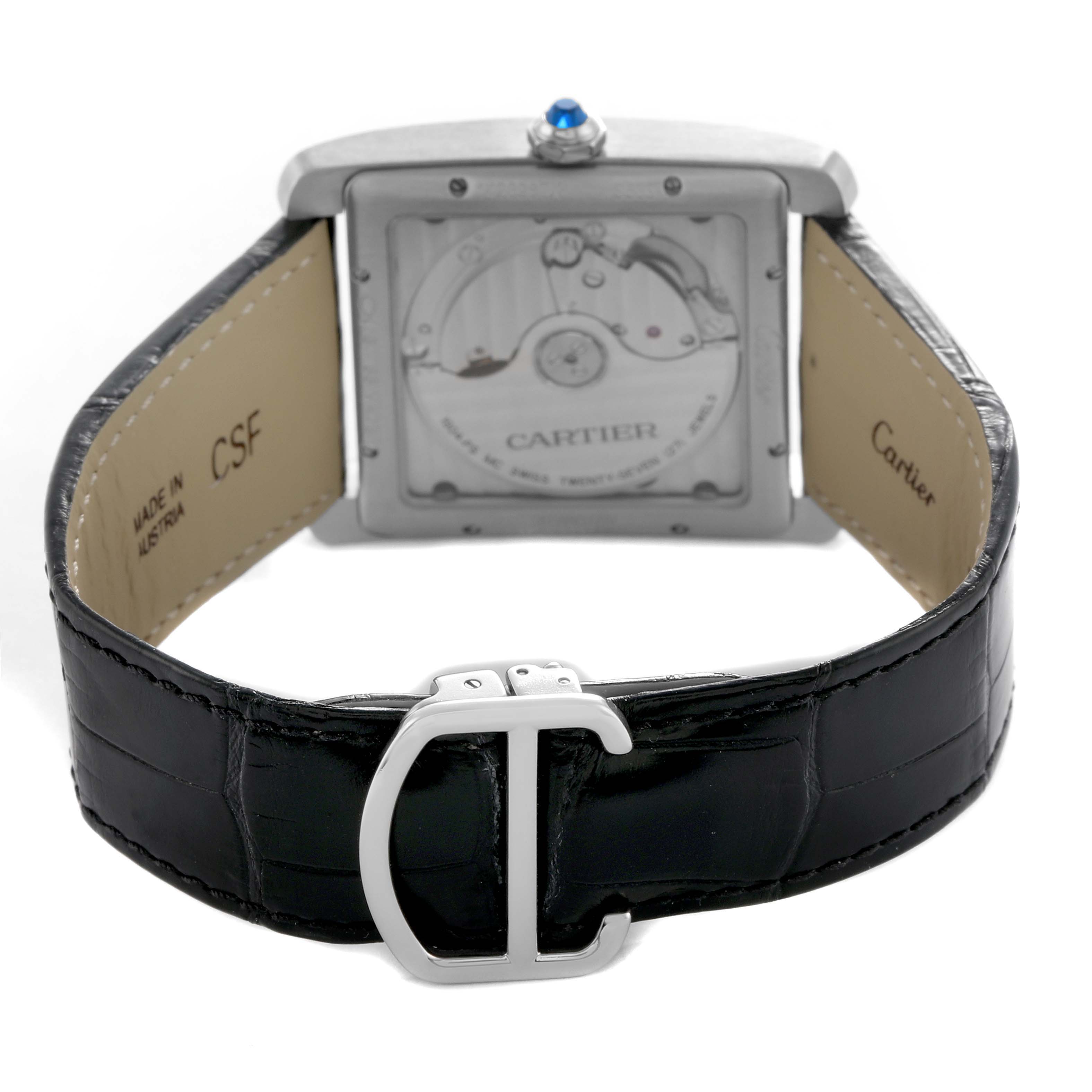 The image shows the back view of the Cartier Tank MC W5330003 Men's Stainless Steel Black Dial watch, highlighting the movement, clasp, and strap.