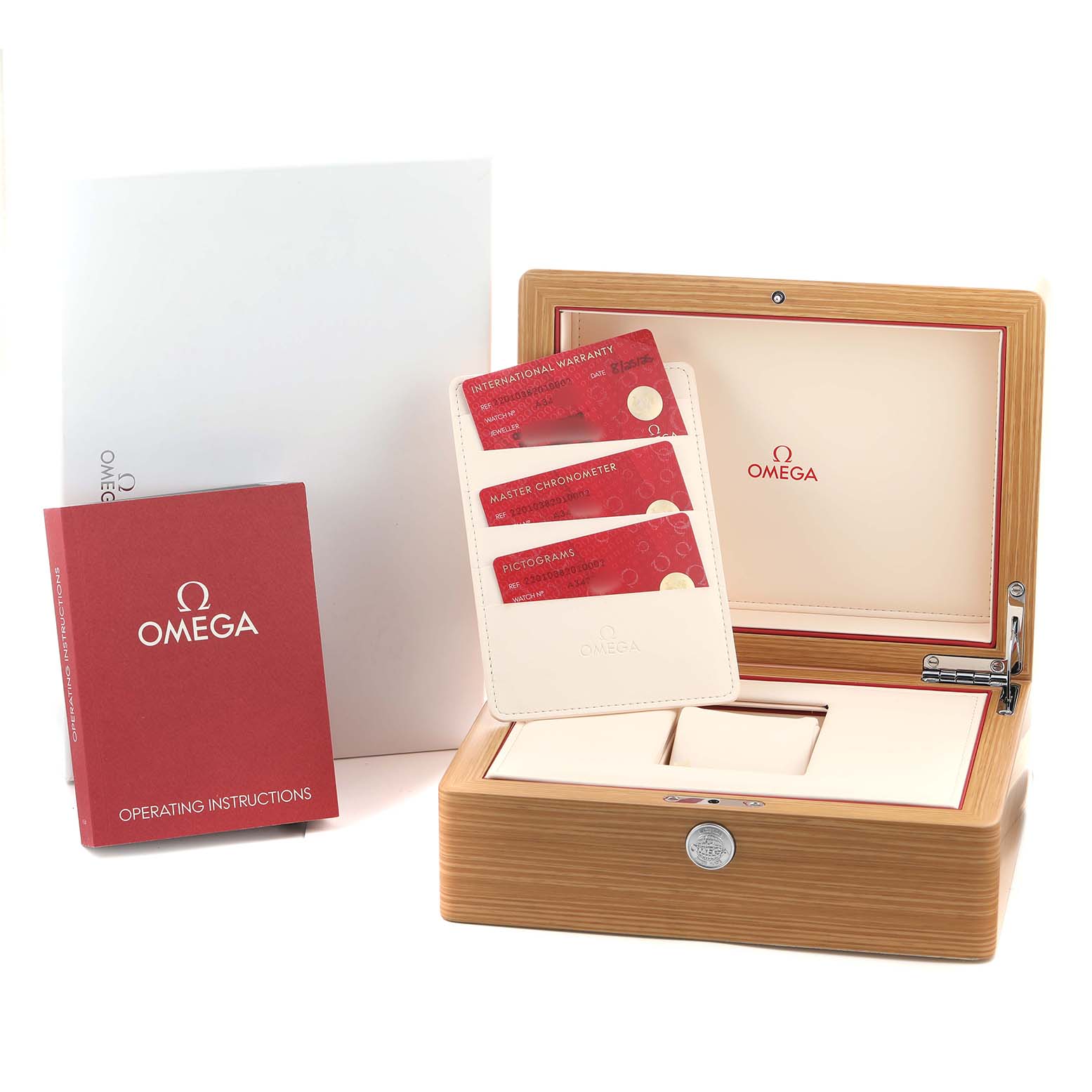 The image shows Omega Aqua Terra 220.10.38.20.10.002 Men's Stainless Steel Green Dial accessories including a wooden box, warranty cards, and operating instructions.