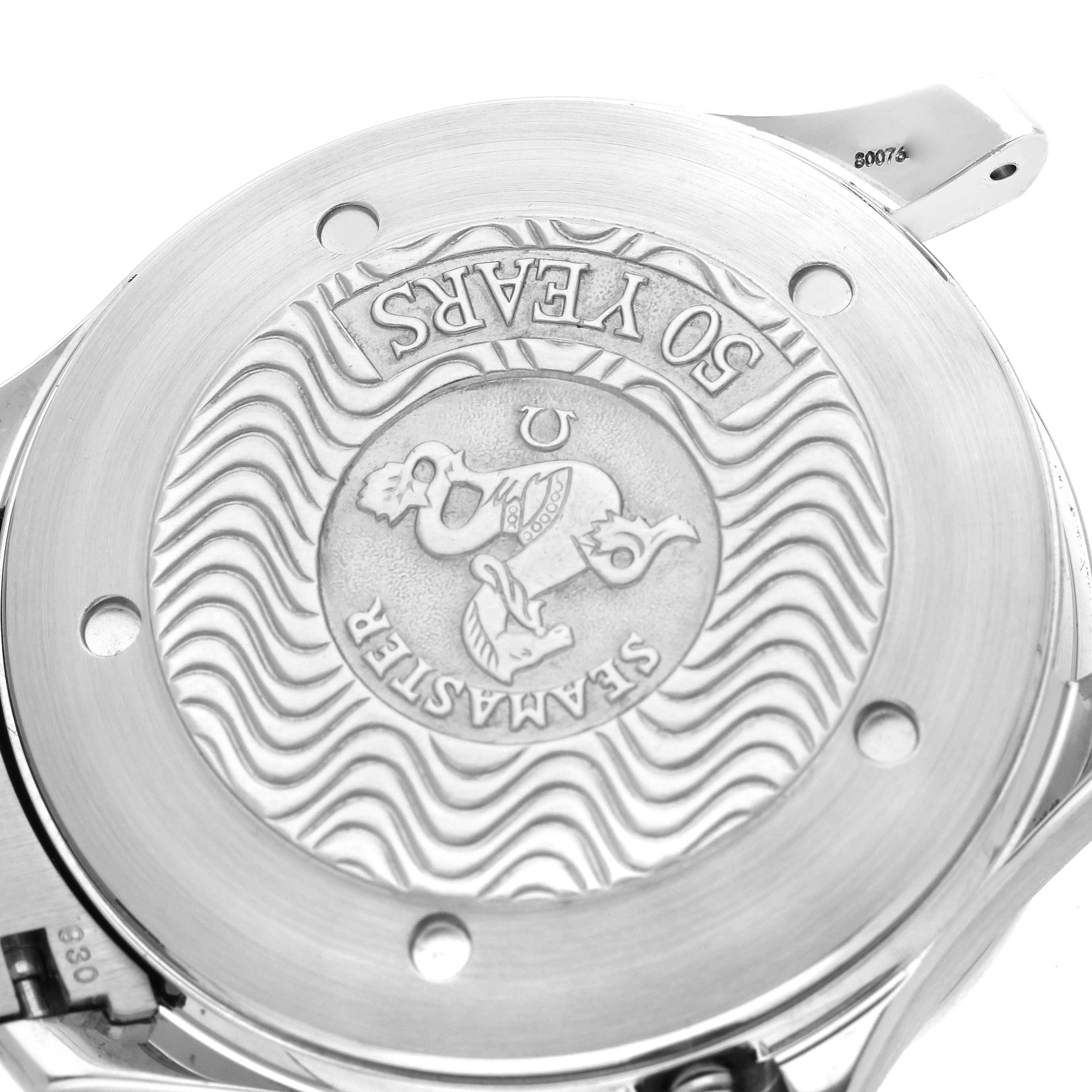 The image shows the engraved case back of an Omega Seamaster 2234.50.00 Men
s Stainless Steel Black Dial 2234.50.00 Men
s Stainless Steel Black Dial watch, angled to highlight the design and inscriptions.