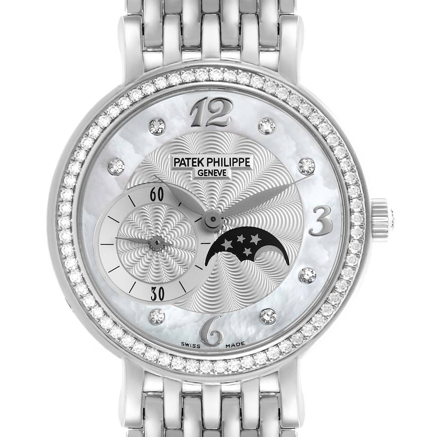 The Patek Philippe Calatrava watch is shown from a front angle, highlighting its face, dial, and diamond bezel.