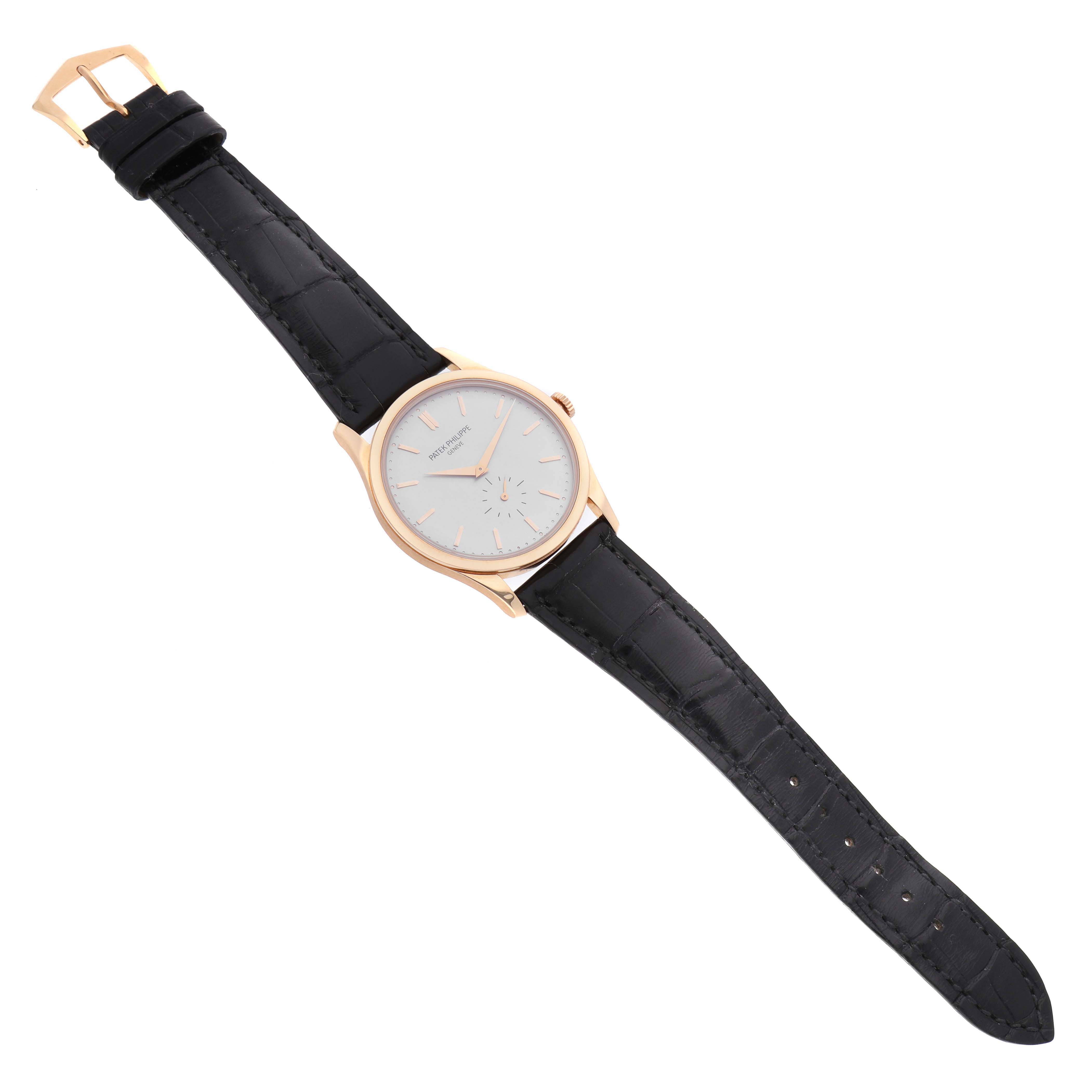 The Patek Philippe Calatrava 5196R Men's Rose Gold Grey Dial watch is shown from the top, highlighting its dial, case, crown, and leather strap.