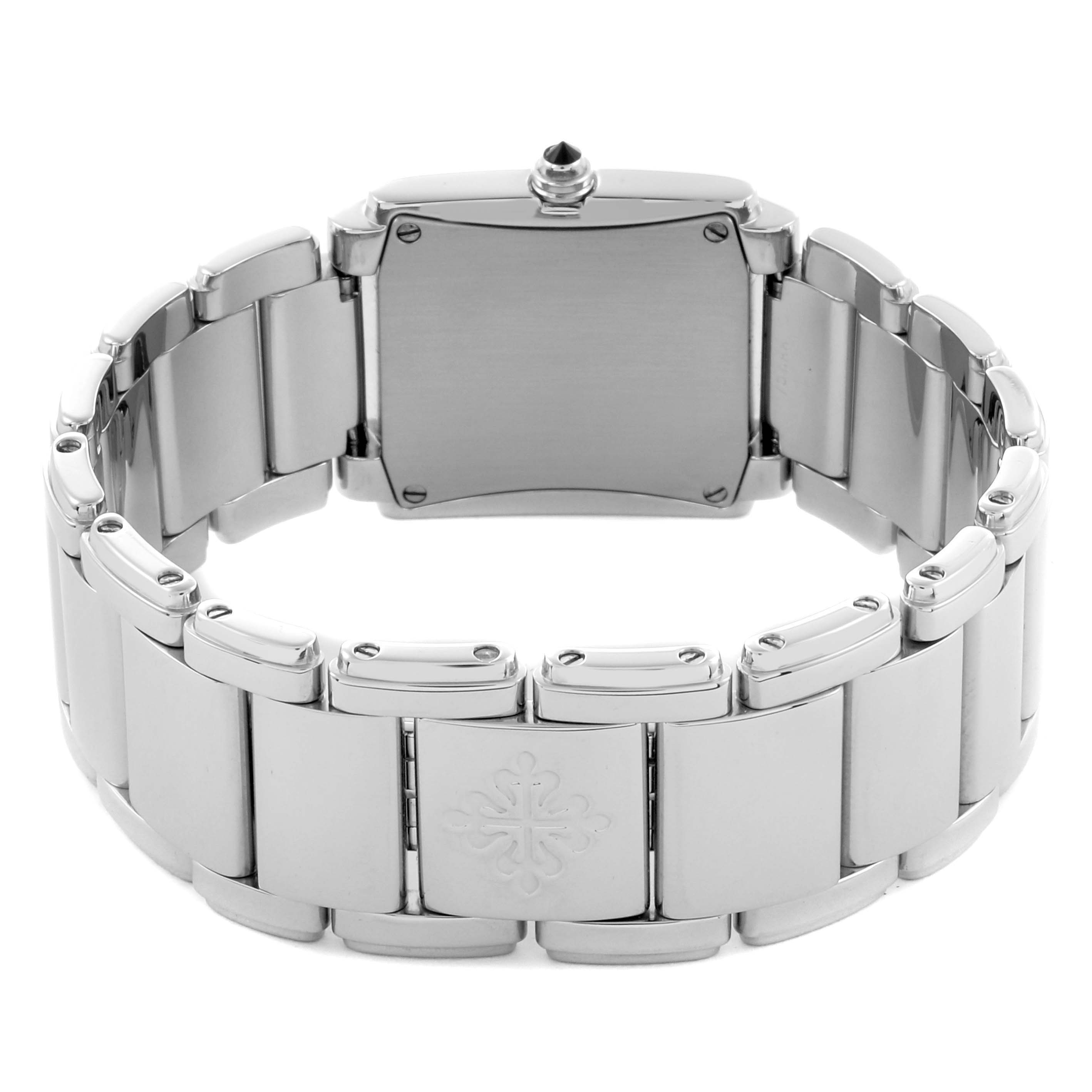 The image shows the back view of a Patek Philippe Twenty-4 4910/10 Women's White Gold Blue Dial 4910/10 Women's White Gold Blue Dial watch, highlighting the case back and bracelet links.