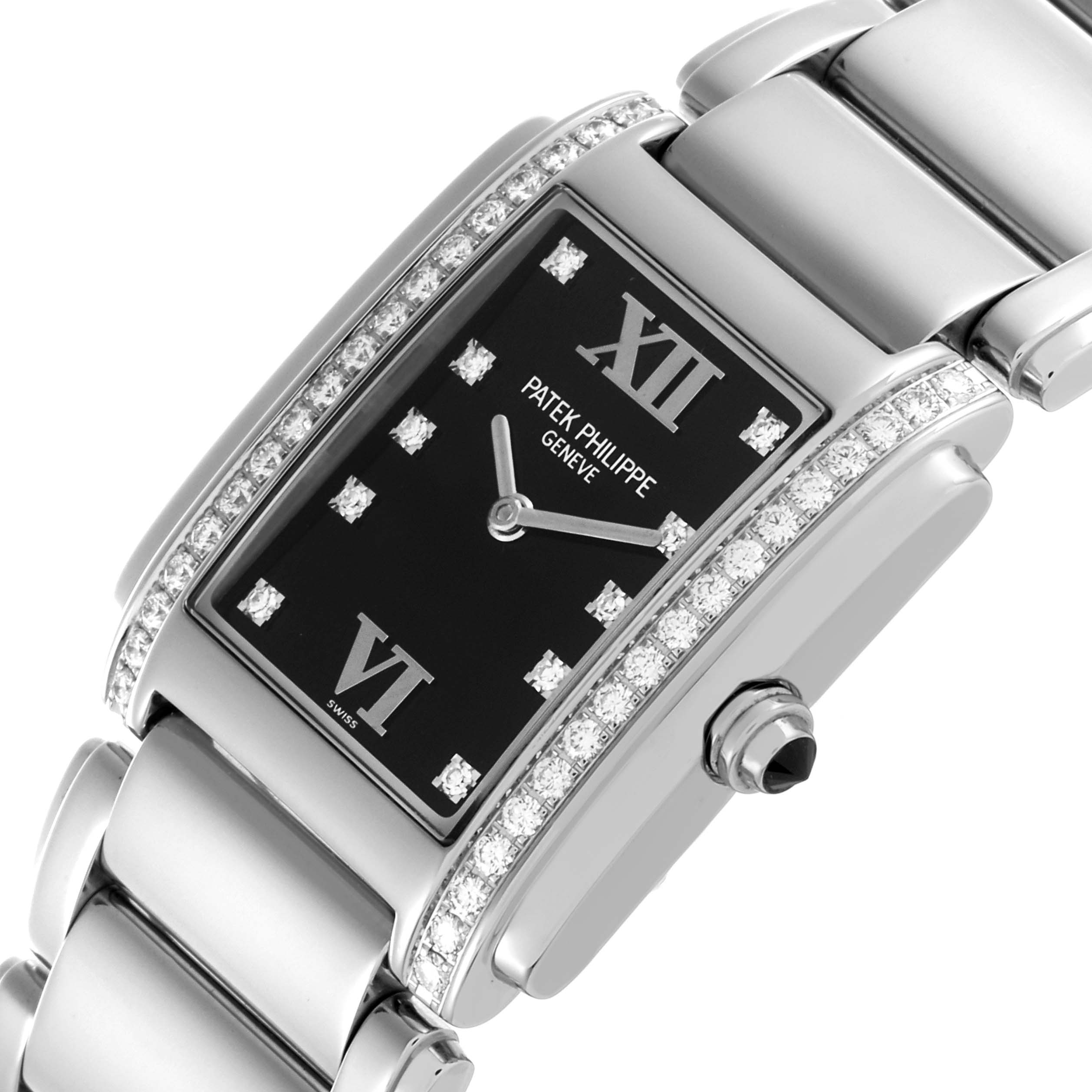 The Patek Philippe Twenty-4 4910/10 Women's White Gold Blue Dial 4910/10 Women's White Gold Blue Dial watch is shown at an oblique angle, highlighting the face, bezel, case, and part of the bracelet.