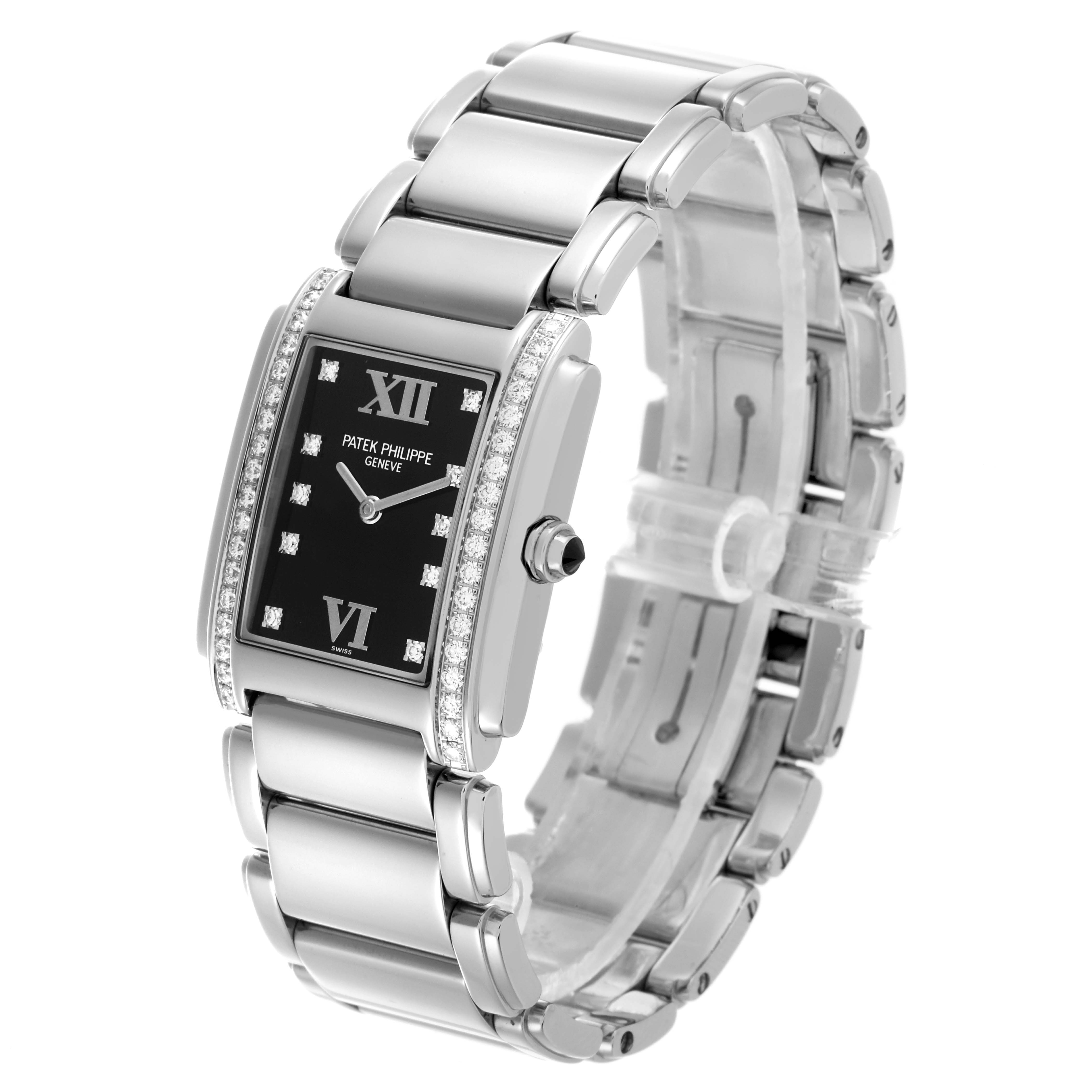 The Patek Philippe Twenty-4 4910/10 Women's White Gold Blue Dial 4910/10 Women's White Gold Blue Dial watch is shown at an angled front view, highlighting the black dial, diamond bezel, and stainless steel bracelet.