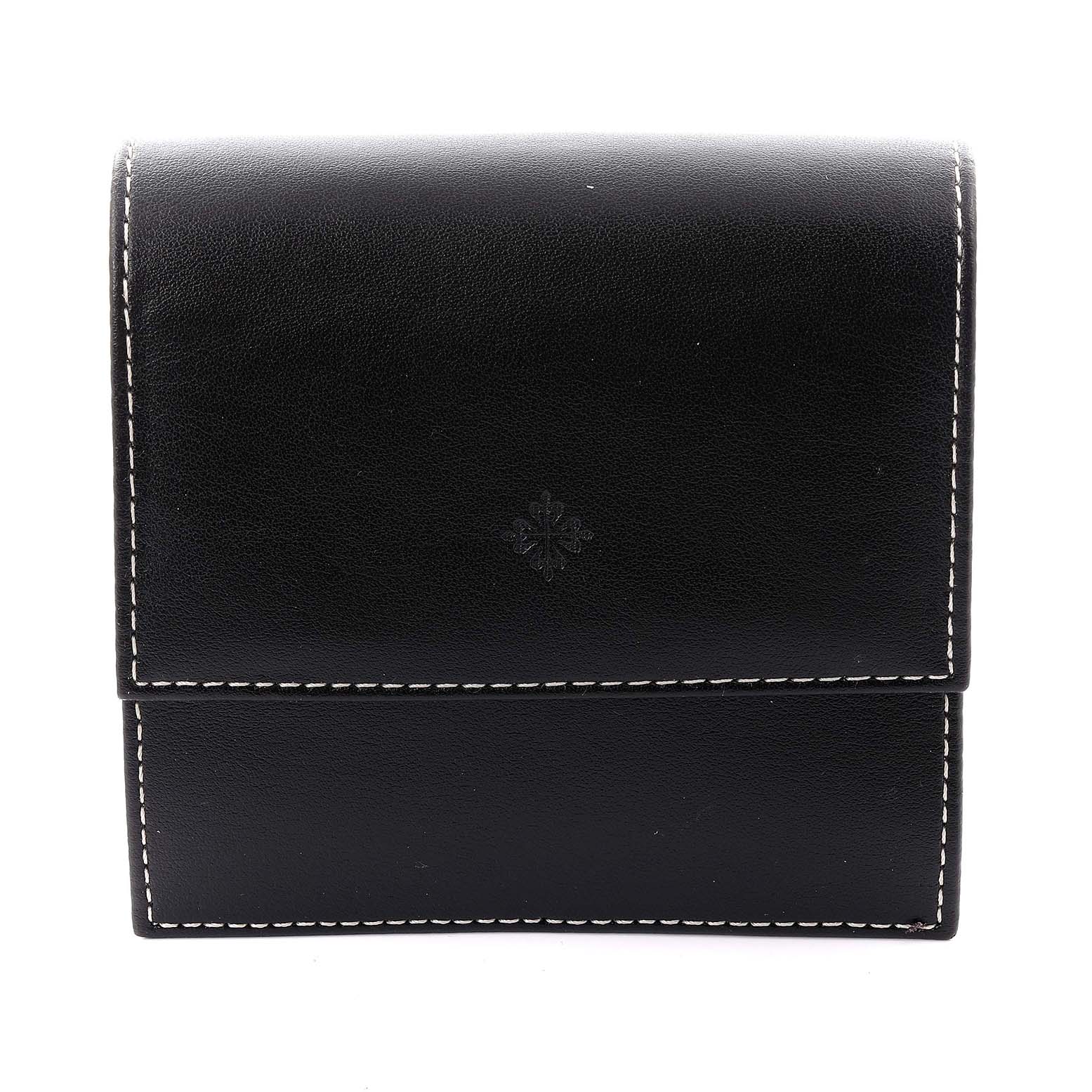 The image shows a black leather case for a Patek Philippe Twenty-4 4910/10 Women's White Gold Blue Dial 4910/10 Women's White Gold Blue Dial watch, viewed from the front.