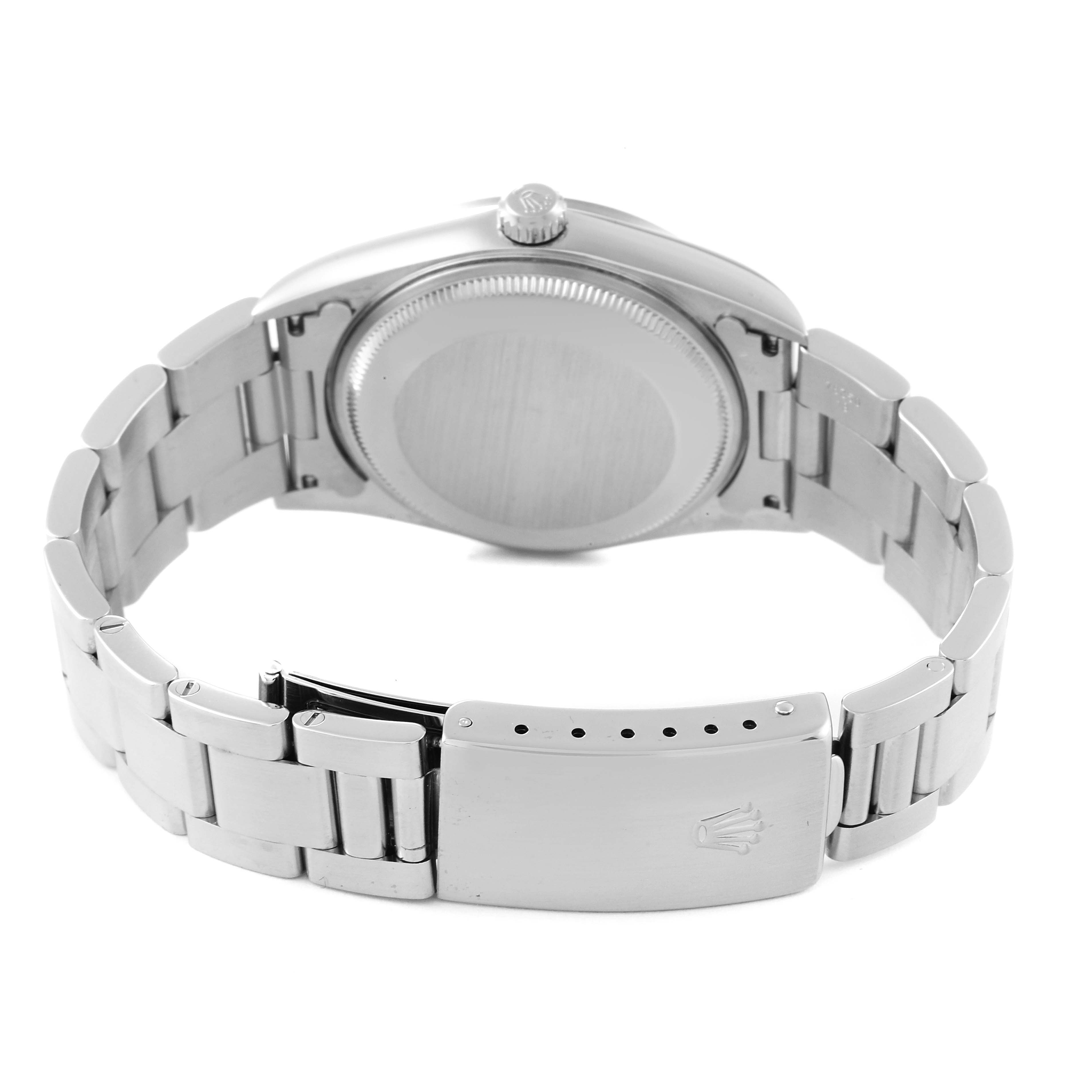 This image shows the back case and bracelet clasp of the Rolex Air-King 14000 Men's Stainless Steel Blue Dial 14000 Men's Stainless Steel Blue Dial watch.