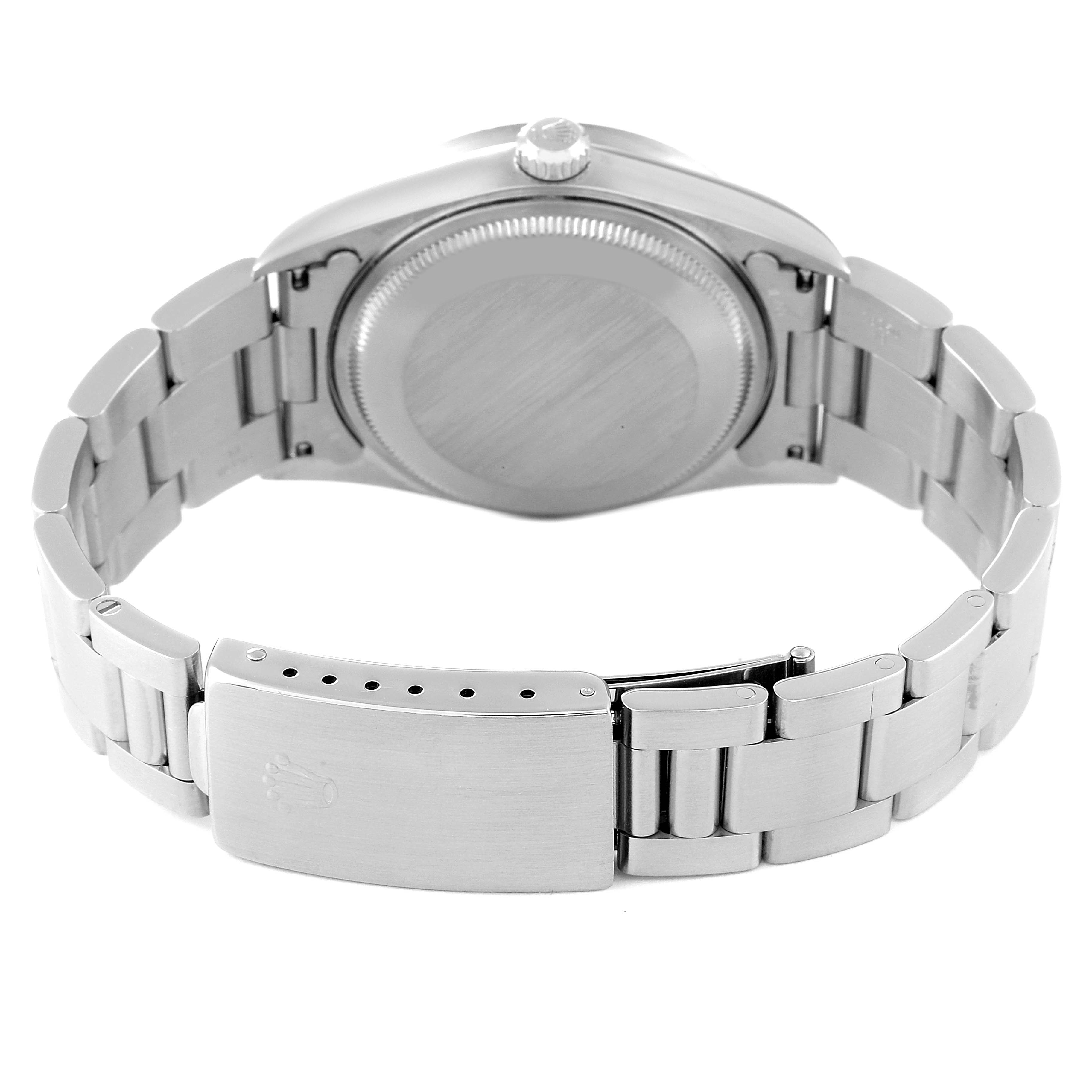 The image shows the back view of a Rolex Air-King 14010 Men's Stainless Steel Blue Dial 14010 Men's Stainless Steel Blue Dial watch, focusing on its case back, bracelet, and clasp.