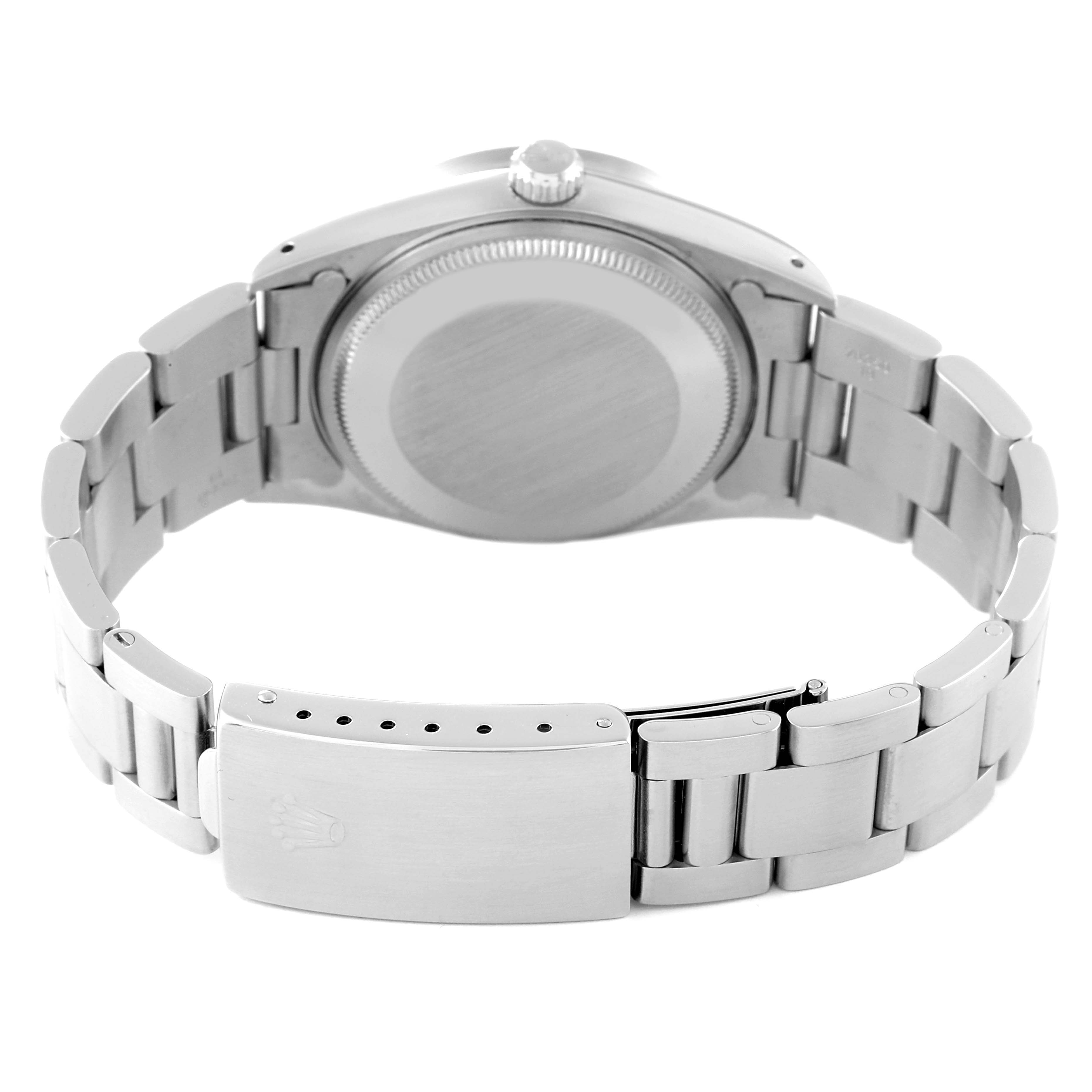 The image shows the back view of a Rolex Air-King 14010 Men's Stainless Steel Blue Dial 14010 Men's Stainless Steel Blue Dial watch, focusing on the case back and clasp of the metal bracelet.