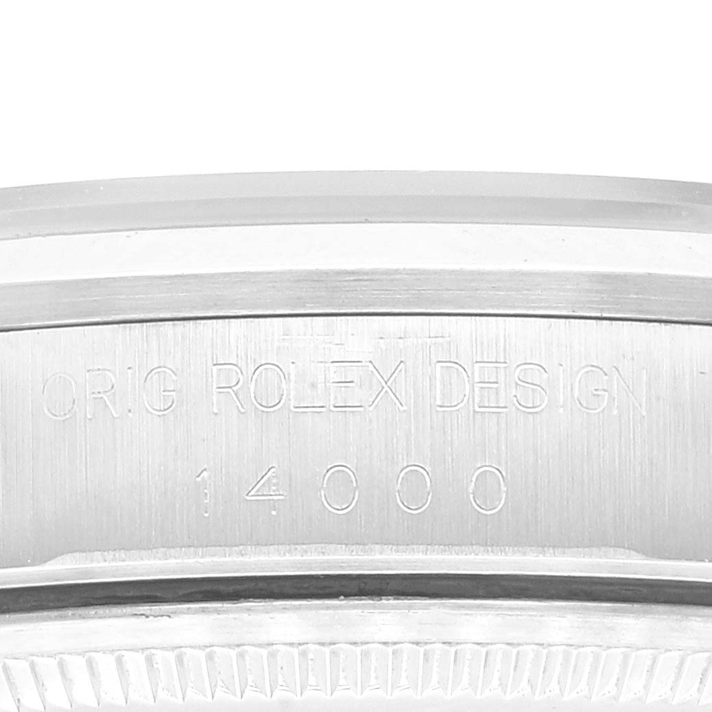 This image shows a close-up of the case side and bezel of a Rolex Air-King 14000 Men's Stainless Steel Pink Dial 14000 Men's Stainless Steel Pink Dial watch, featuring the engraved design and model number.