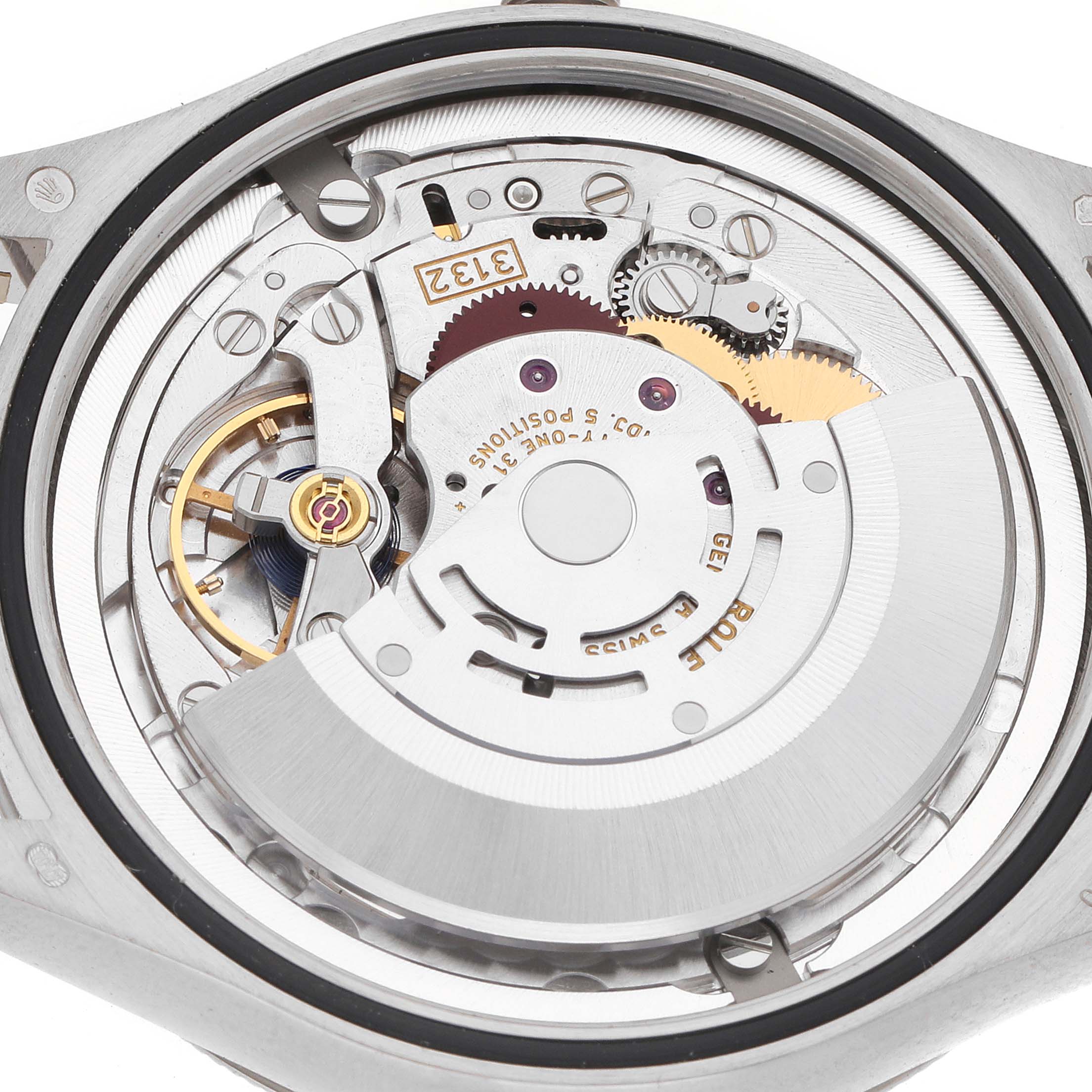The image shows the movement of the Rolex Cellini 50609 Men's White Gold Silver Dial watch from the back, revealing gears, rotors, and intricate components.