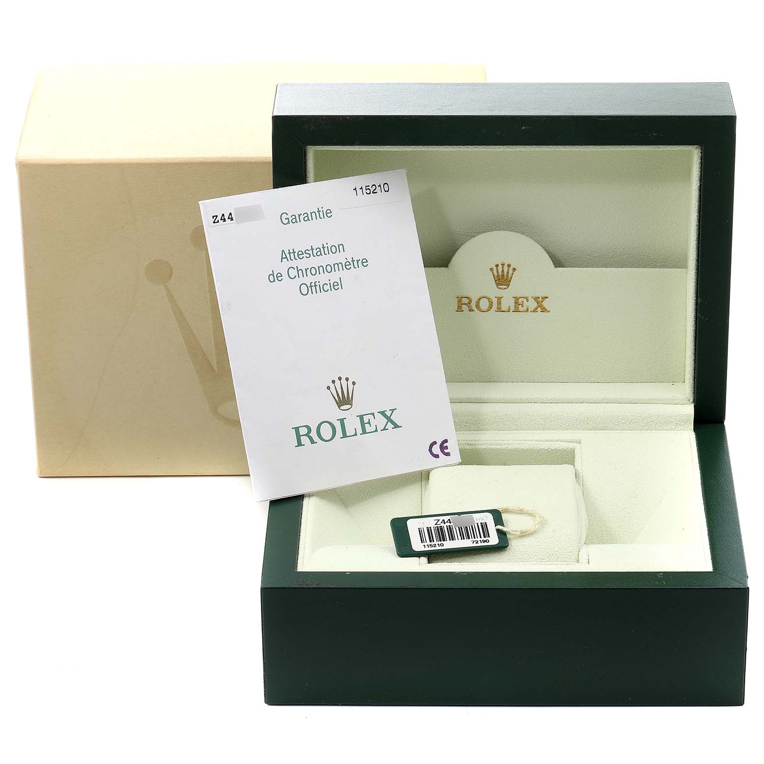 The image shows a Rolex Date 115210 Men's Stainless Steel Silver Dial 115210 Men's Stainless Steel Silver Dial model watch box with warranty papers and a tag.