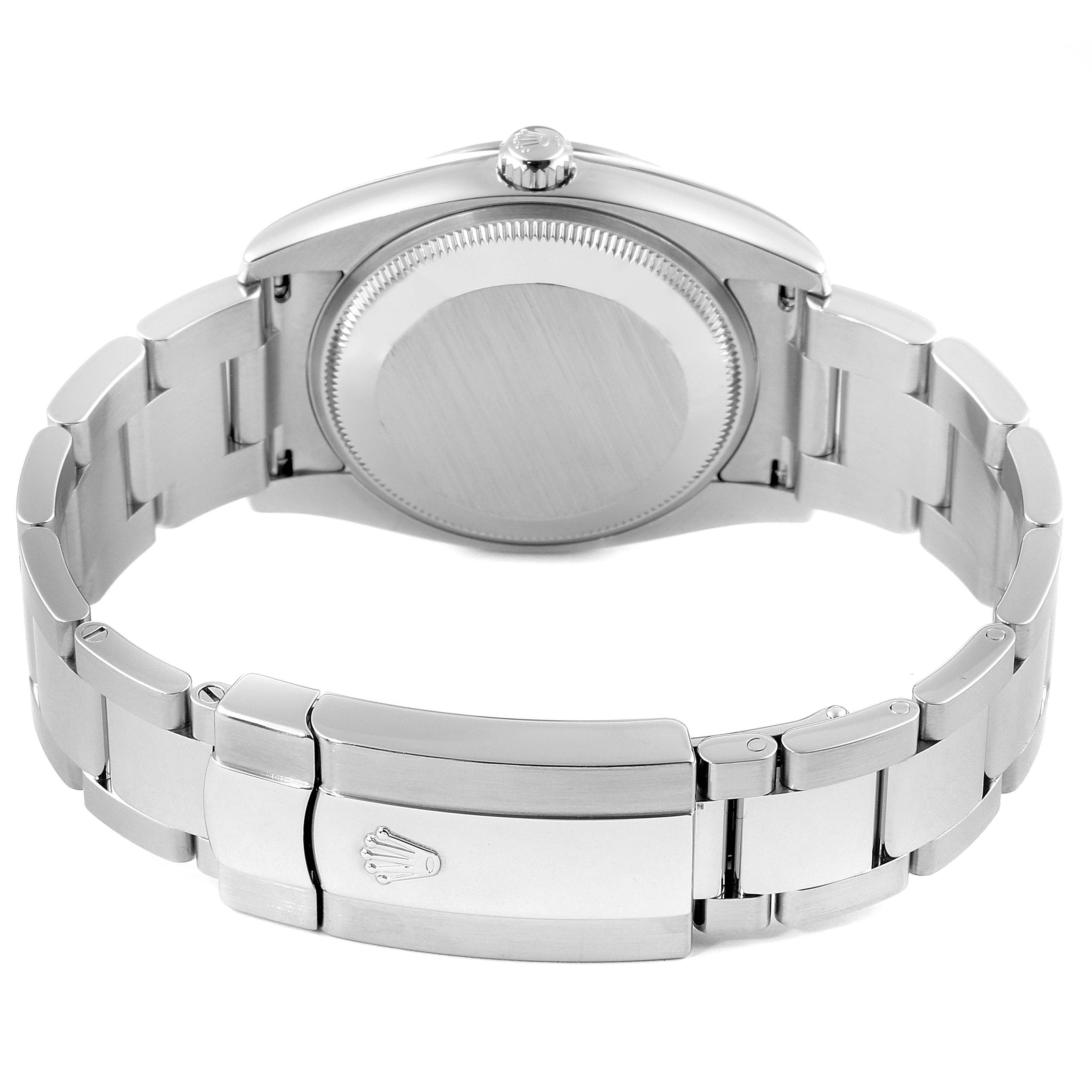 The image shows the back view and bracelet of a Rolex Date 115210 Men's Stainless Steel Silver Dial 115210 Men's Stainless Steel Silver Dial model watch, focusing on the clasp and case back.