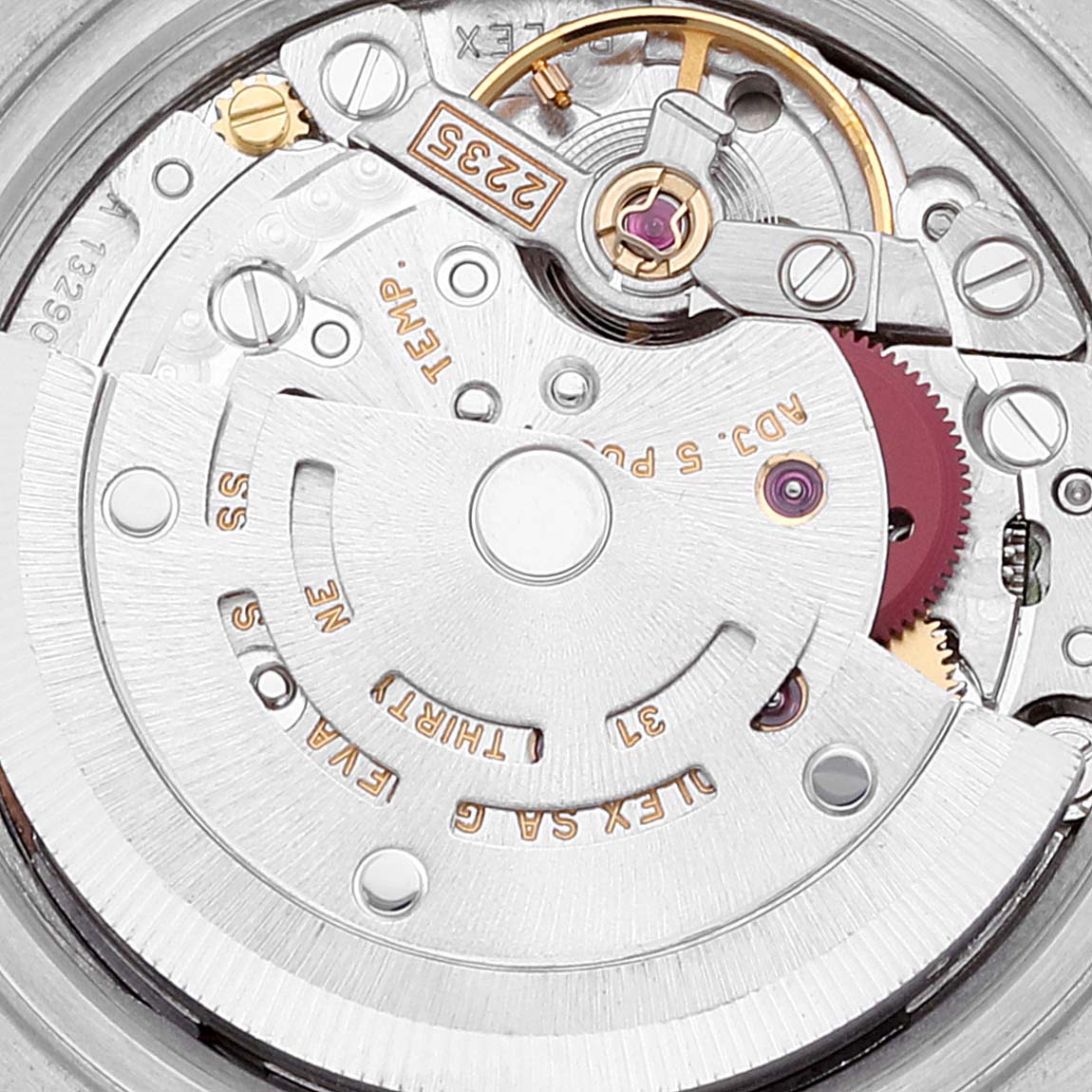 The image shows a close-up of the movement and internal mechanisms of a Rolex Datejust 79174 Women's Stainless Steel Pink Dial 79174 Women's Stainless Steel Pink Dial watch.