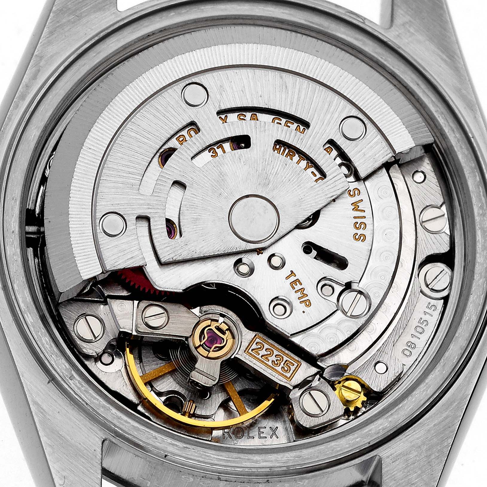 This image shows the movement of a Rolex Datejust 79174 Women's Stainless Steel White Dial 79174 Women's Stainless Steel White Dial from the back, highlighting the intricate mechanical parts.