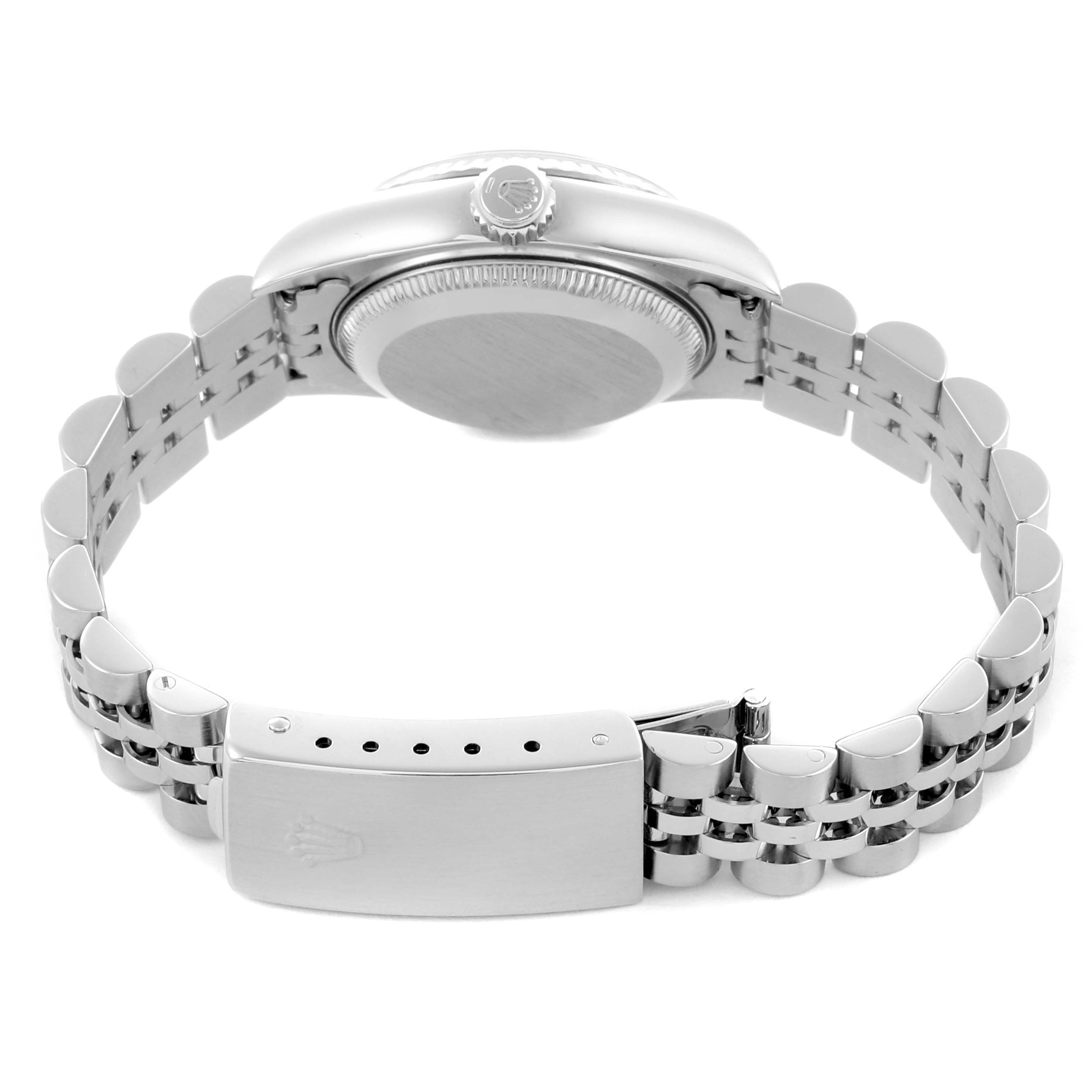 The image shows the Rolex Datejust 79174 Women's Stainless Steel White Dial 79174 Women's Stainless Steel White Dial watch from the back, displaying the bracelet and clasp, as well as the case back and crown.