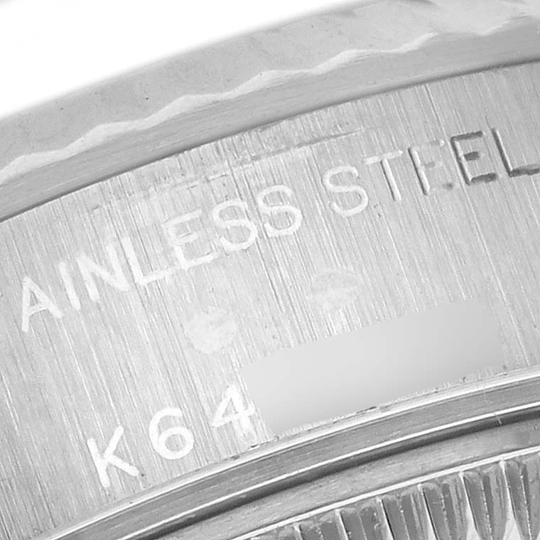 The image shows a close-up of the stainless steel case back of a Rolex Datejust 79174 Women's Stainless Steel White Dial 79174 Women's Stainless Steel White Dial watch.