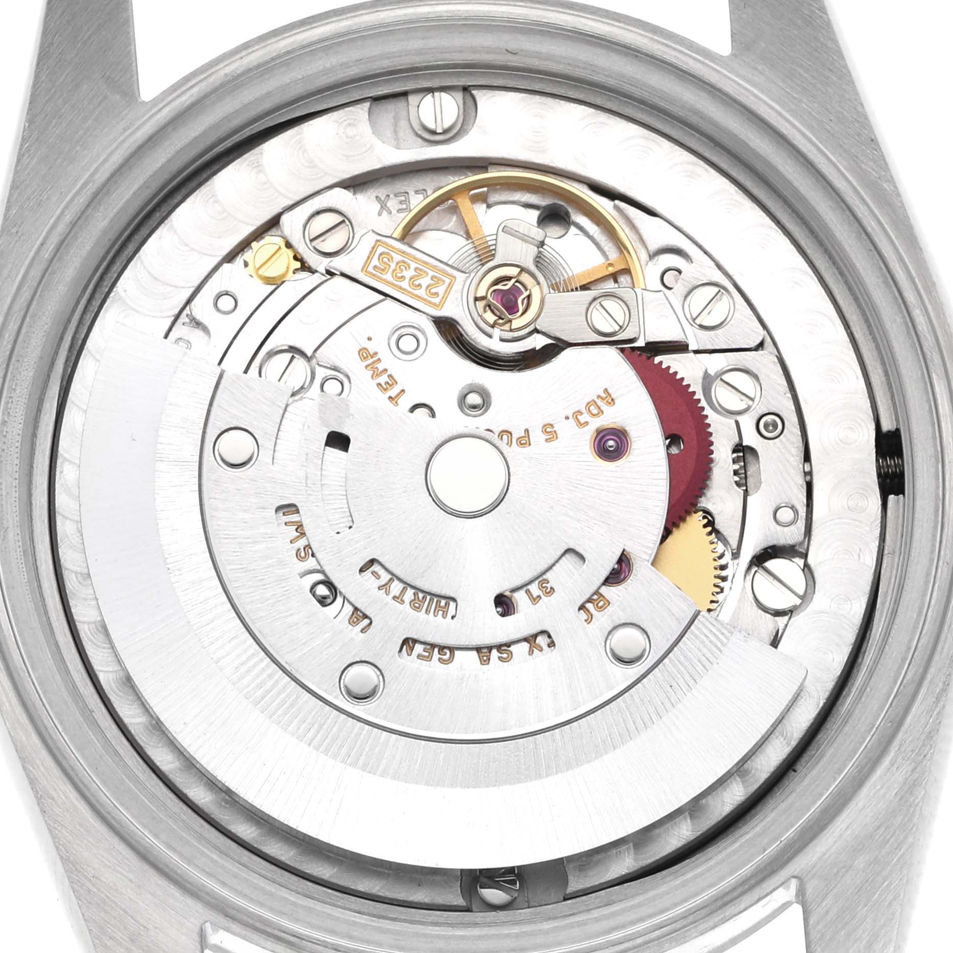 The image shows the exposed movement of a Rolex Mid-Size 78240 Women's Stainless Steel Silver Dial 78240 Women's Stainless Steel Silver Dial watch, highlighting gears and the rotor.