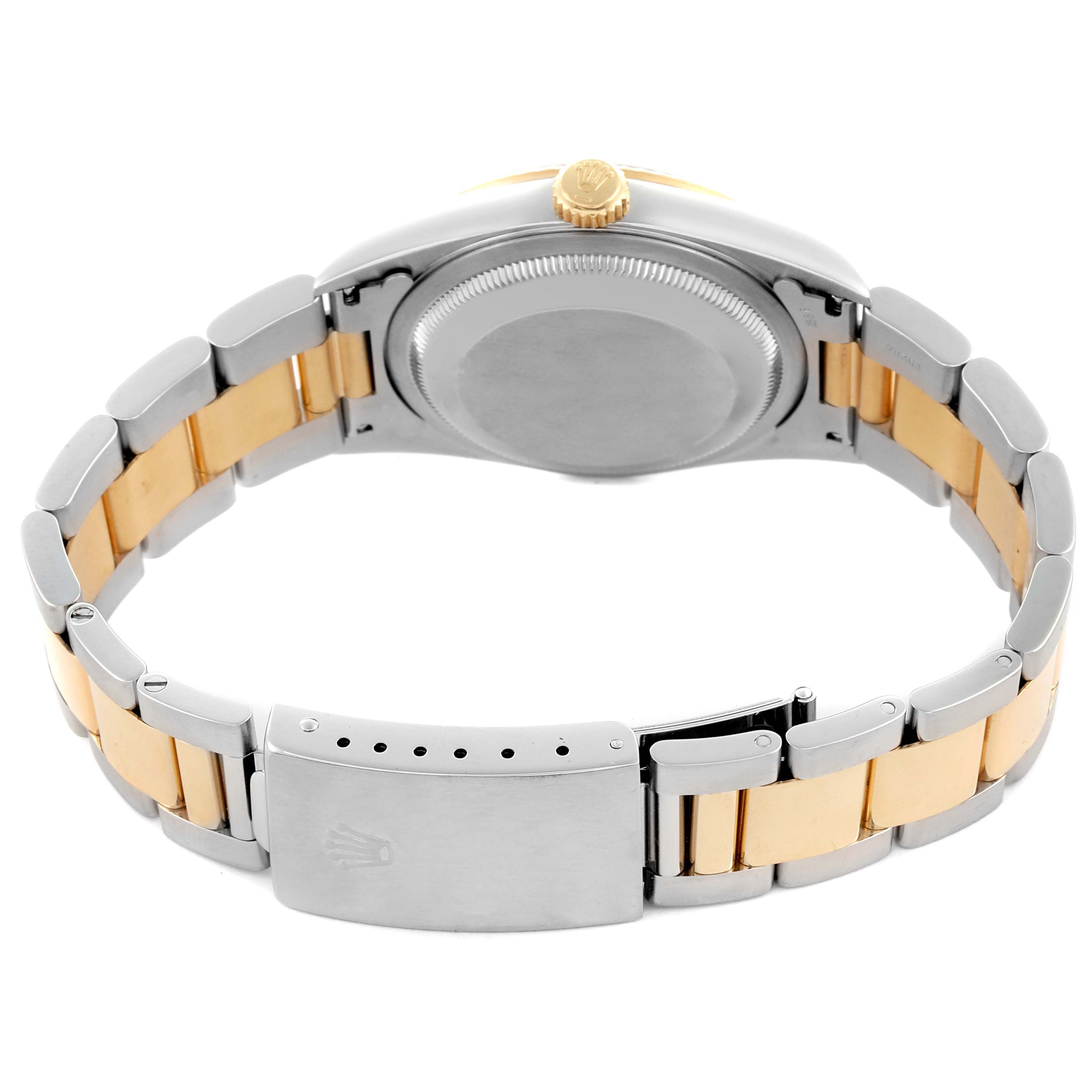 The image shows the Rolex Datejust 16233 Men's Steel and Gold (two tone) Black Dial 16233 Men's Steel and Gold (two tone) Black Dial watch from the back, highlighting the bracelet and clasp.